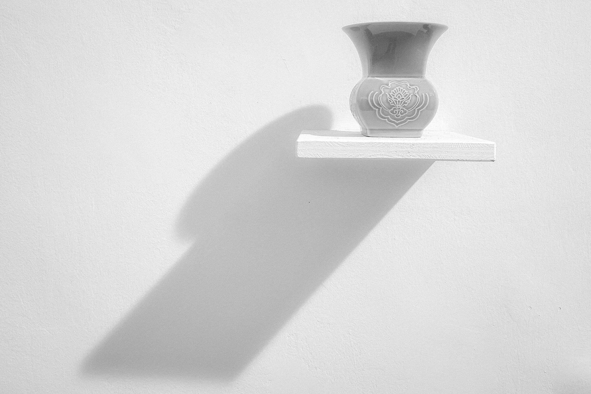 Delicate Vase on Shelf