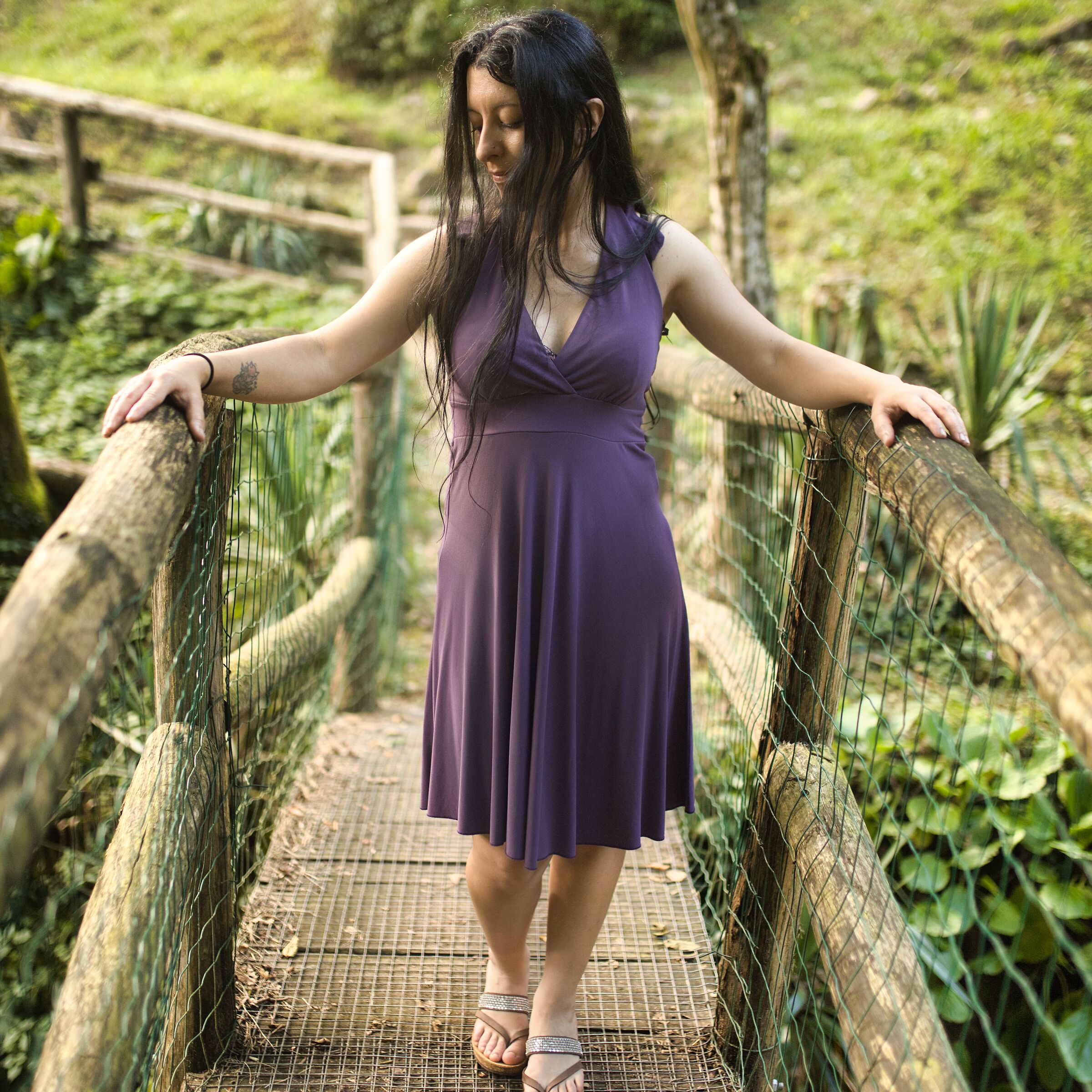 Purple surrounded by greenery