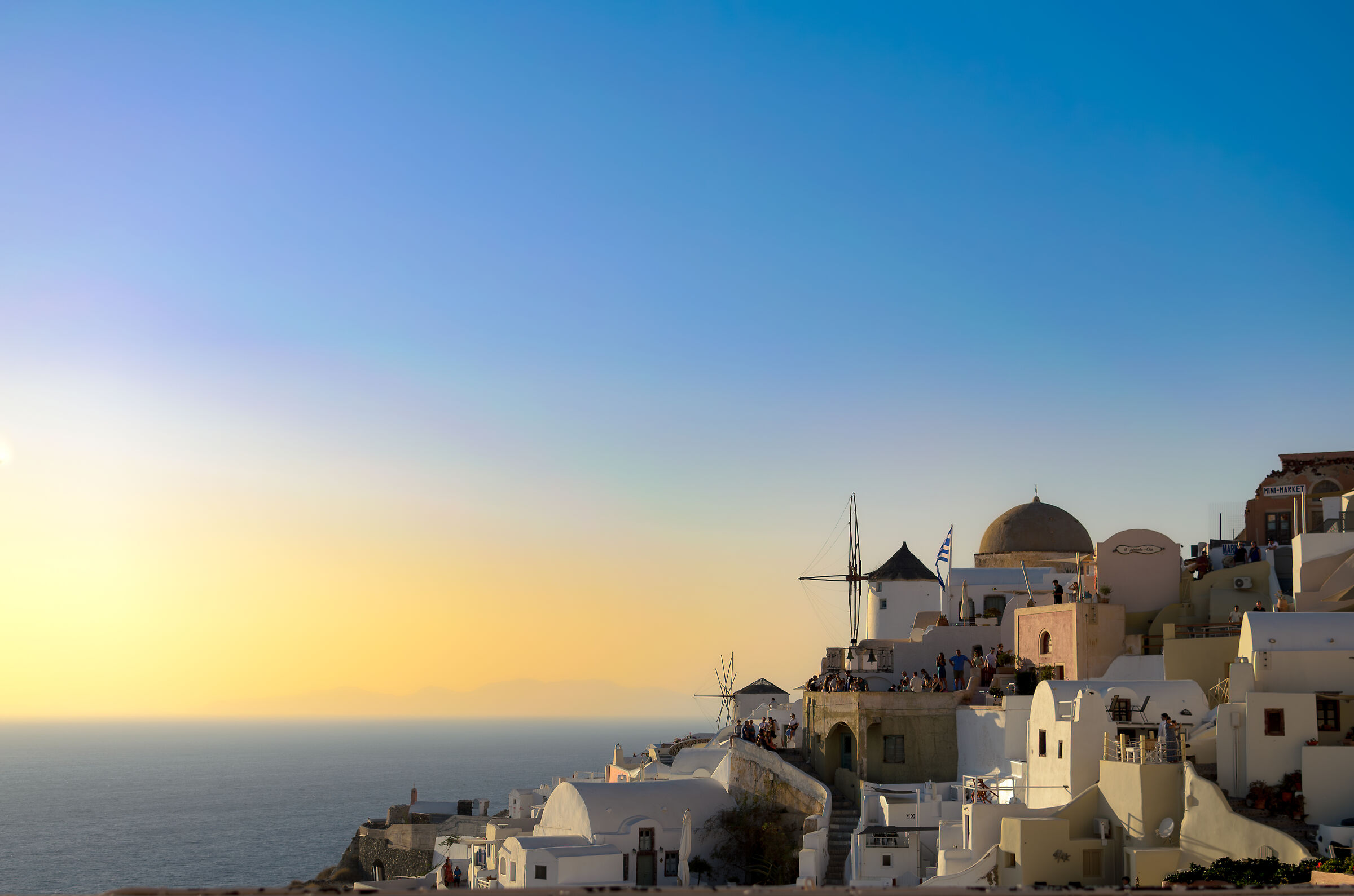 Sunset with mill in Oia
