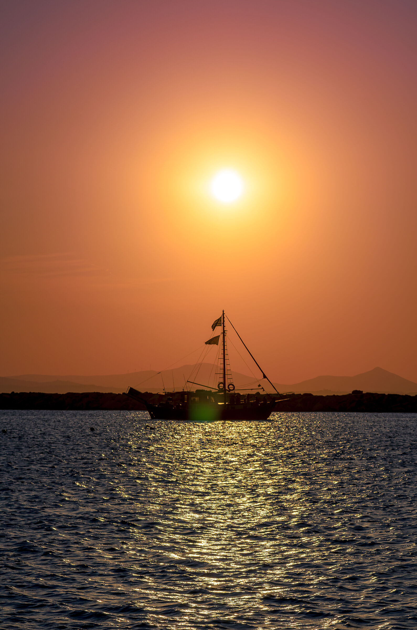 Sunset boat in Naxos