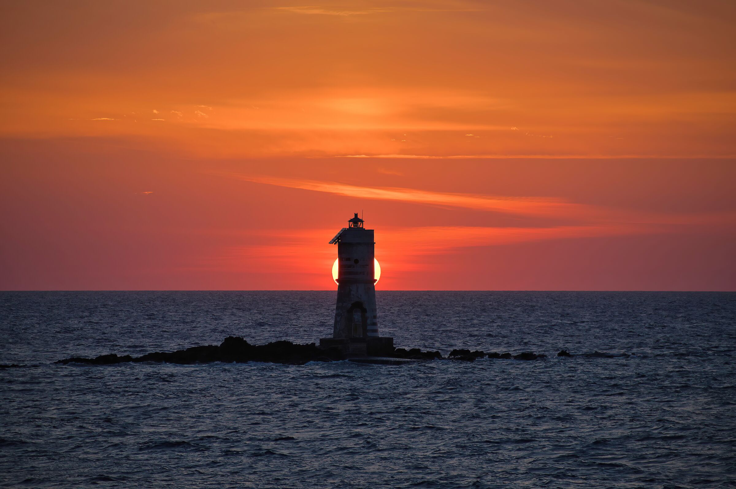 Sunset at the Mangiabarche Lighthouse (Calasetta)