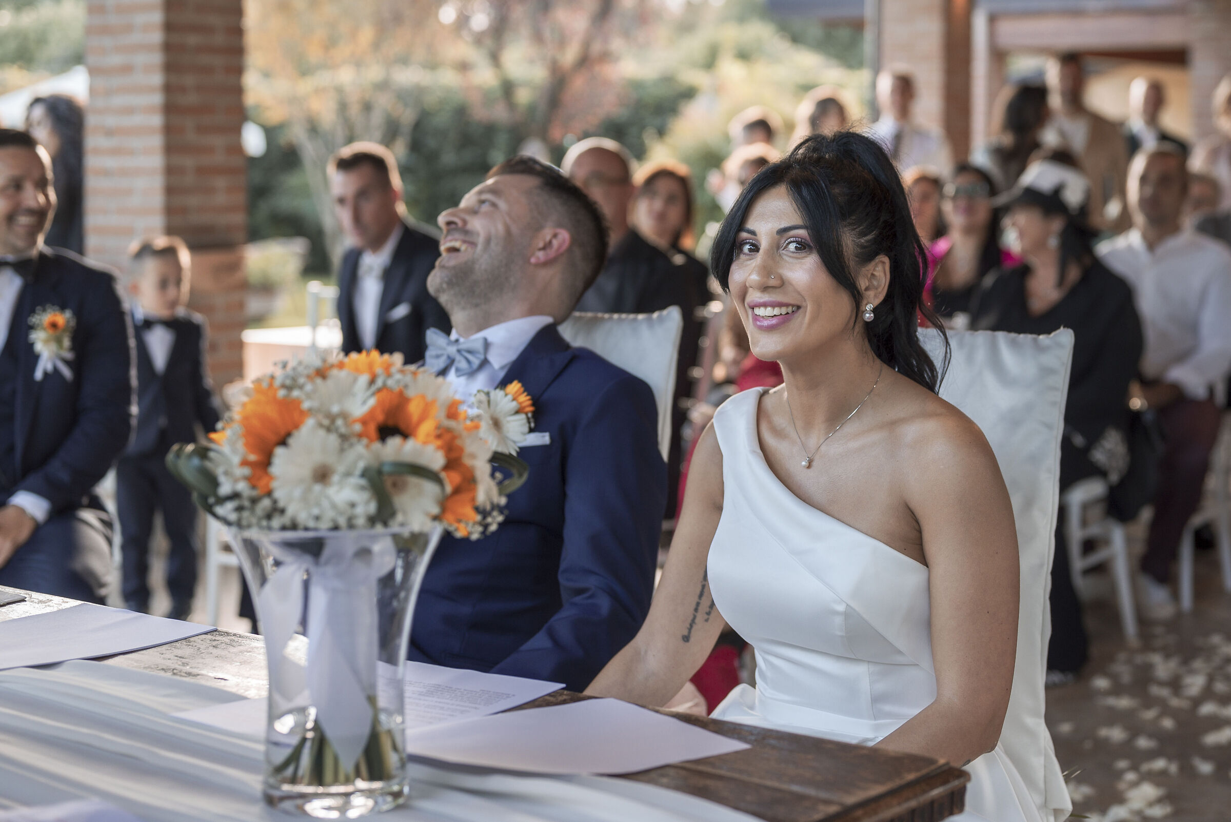 Who starts laughing...