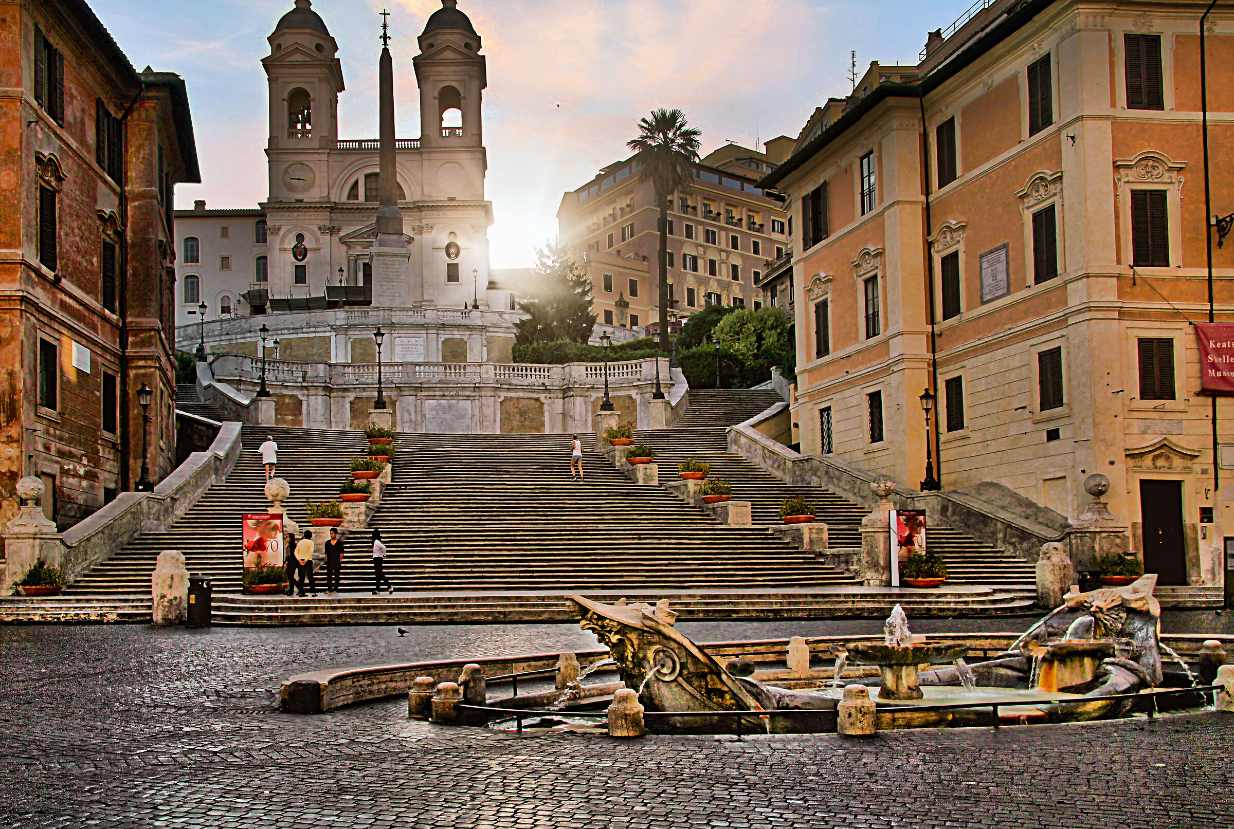 First rays of sunshine over the Spanish Steps