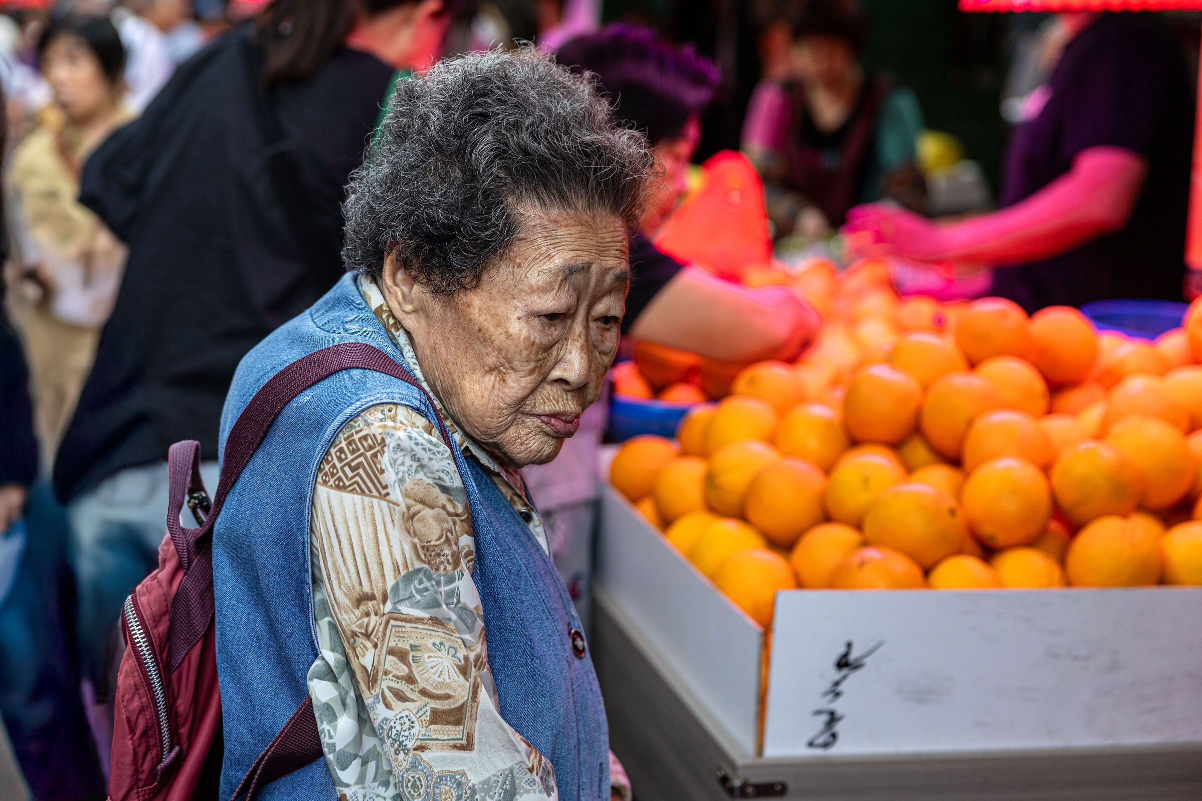 Old chinese lady in the street market