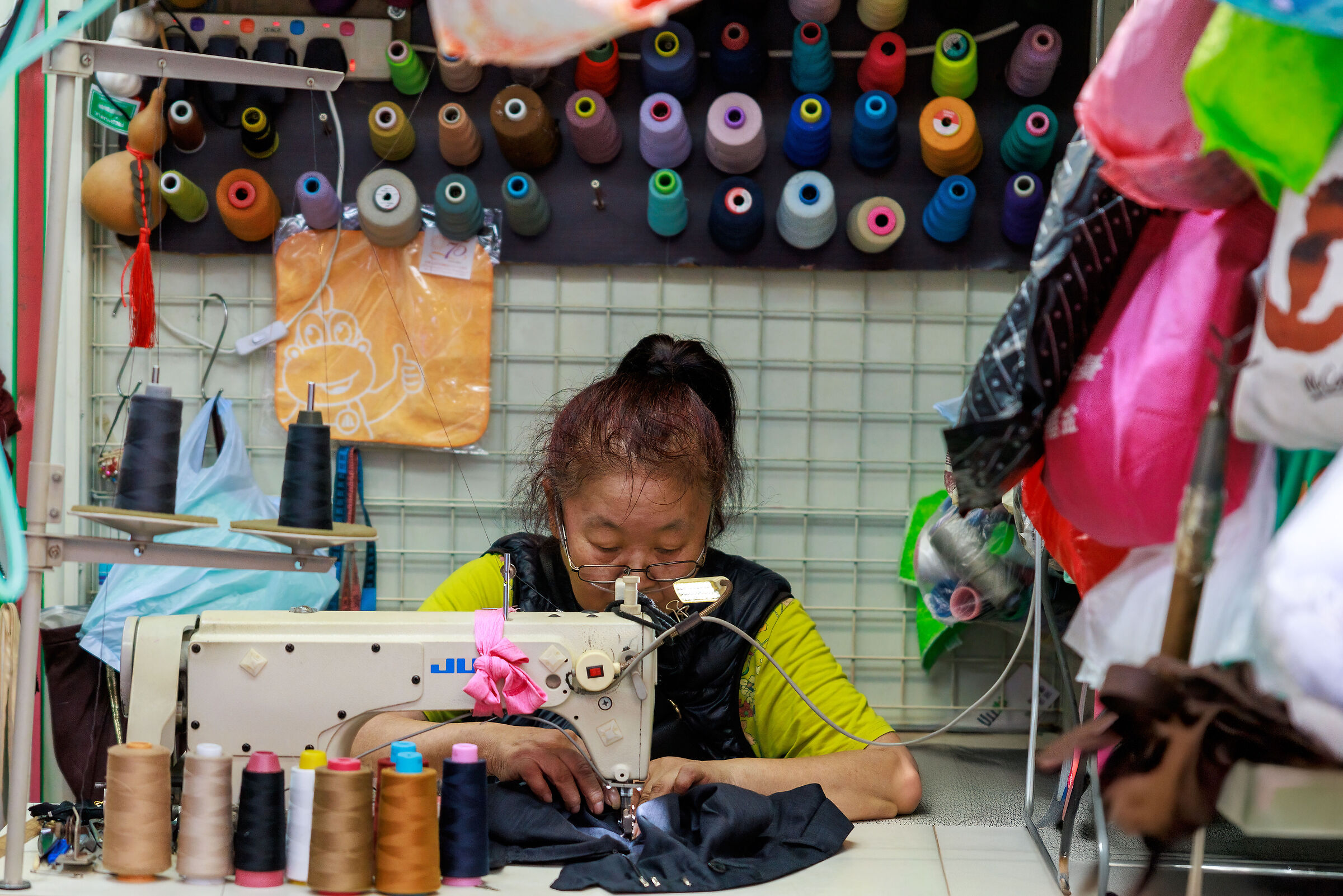 seamstress along the street of MongKok