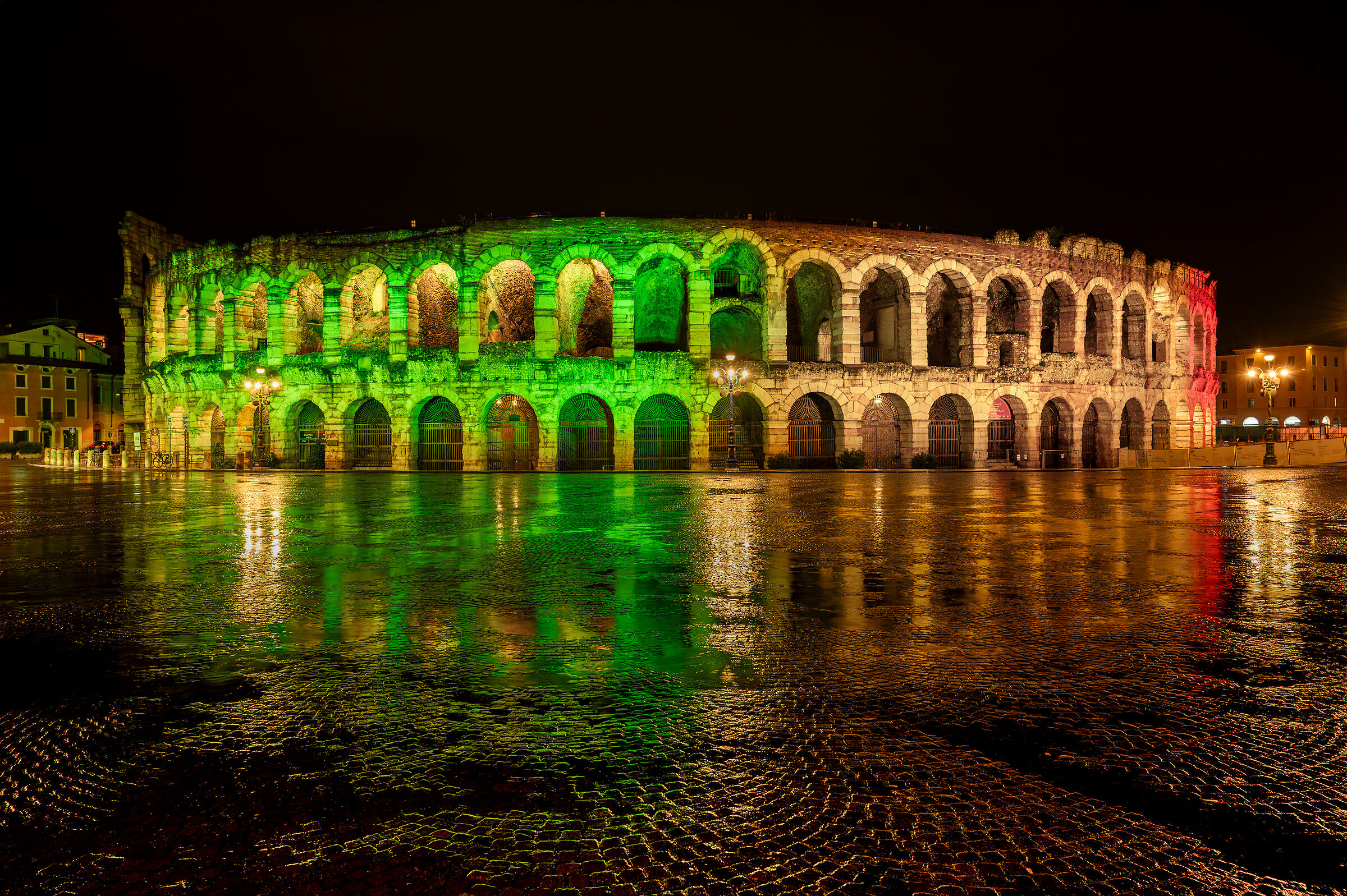 Verona, the arena illuminated with the Italian flag