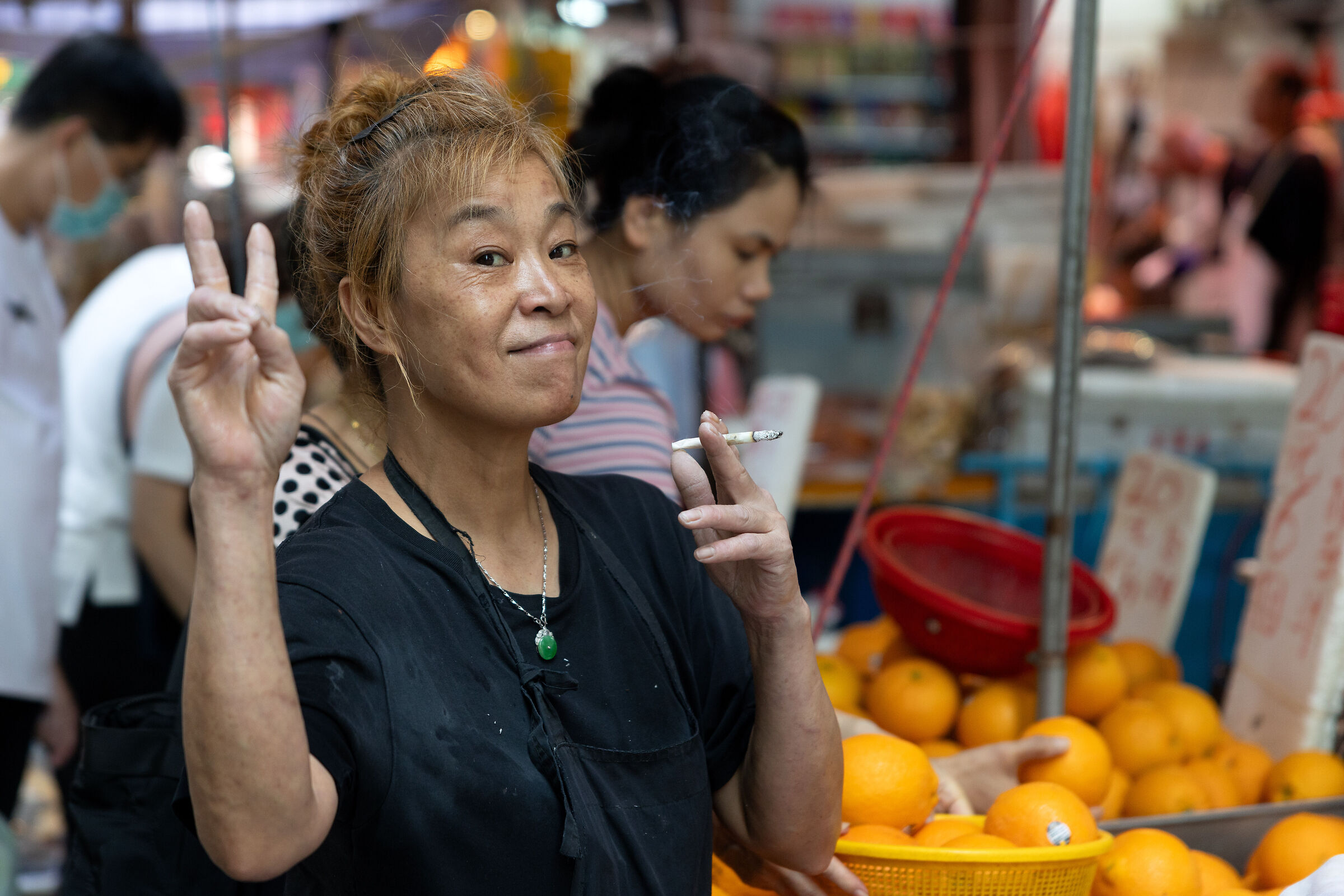 Smoker lady in the market