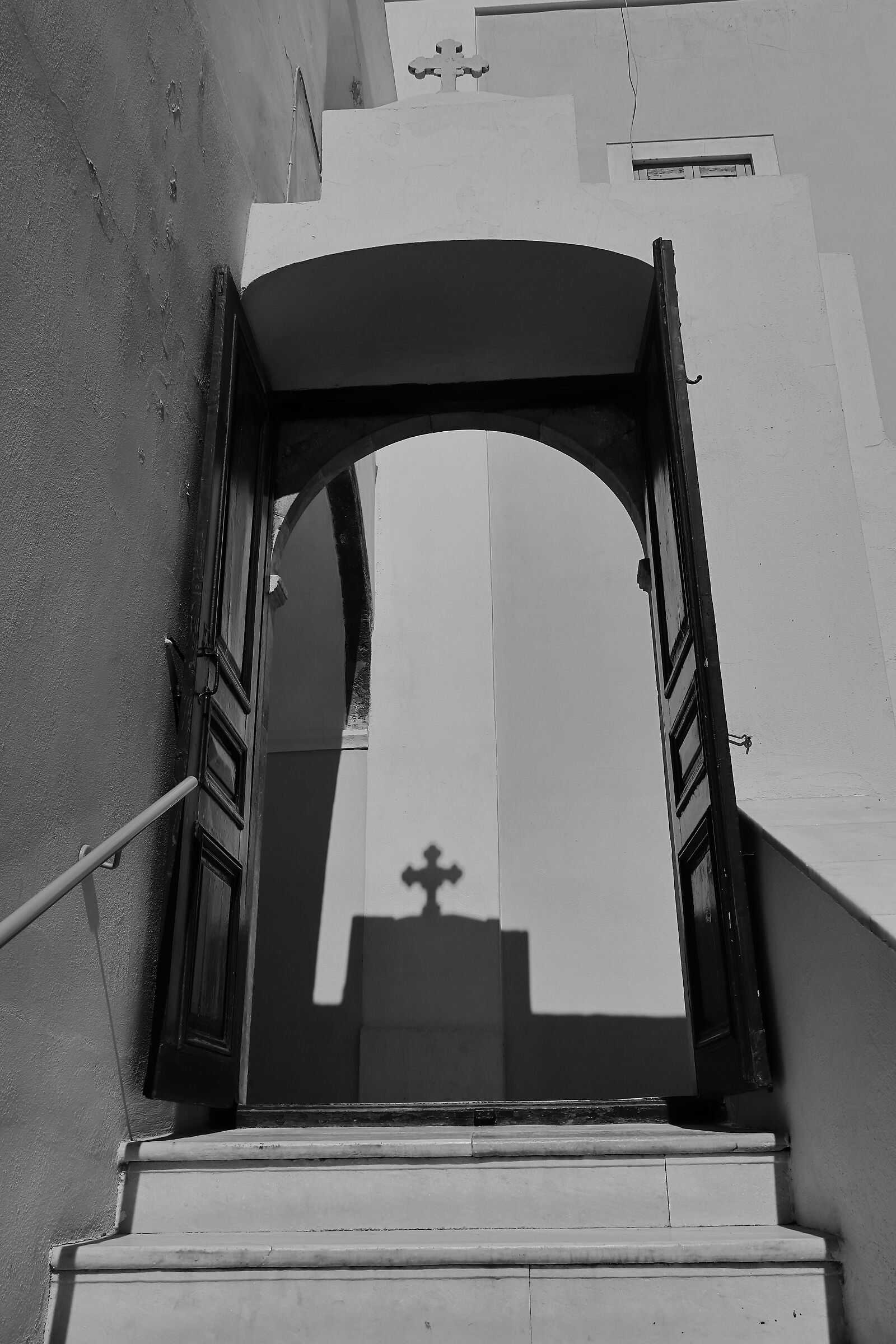 Cross shadow in Santorini