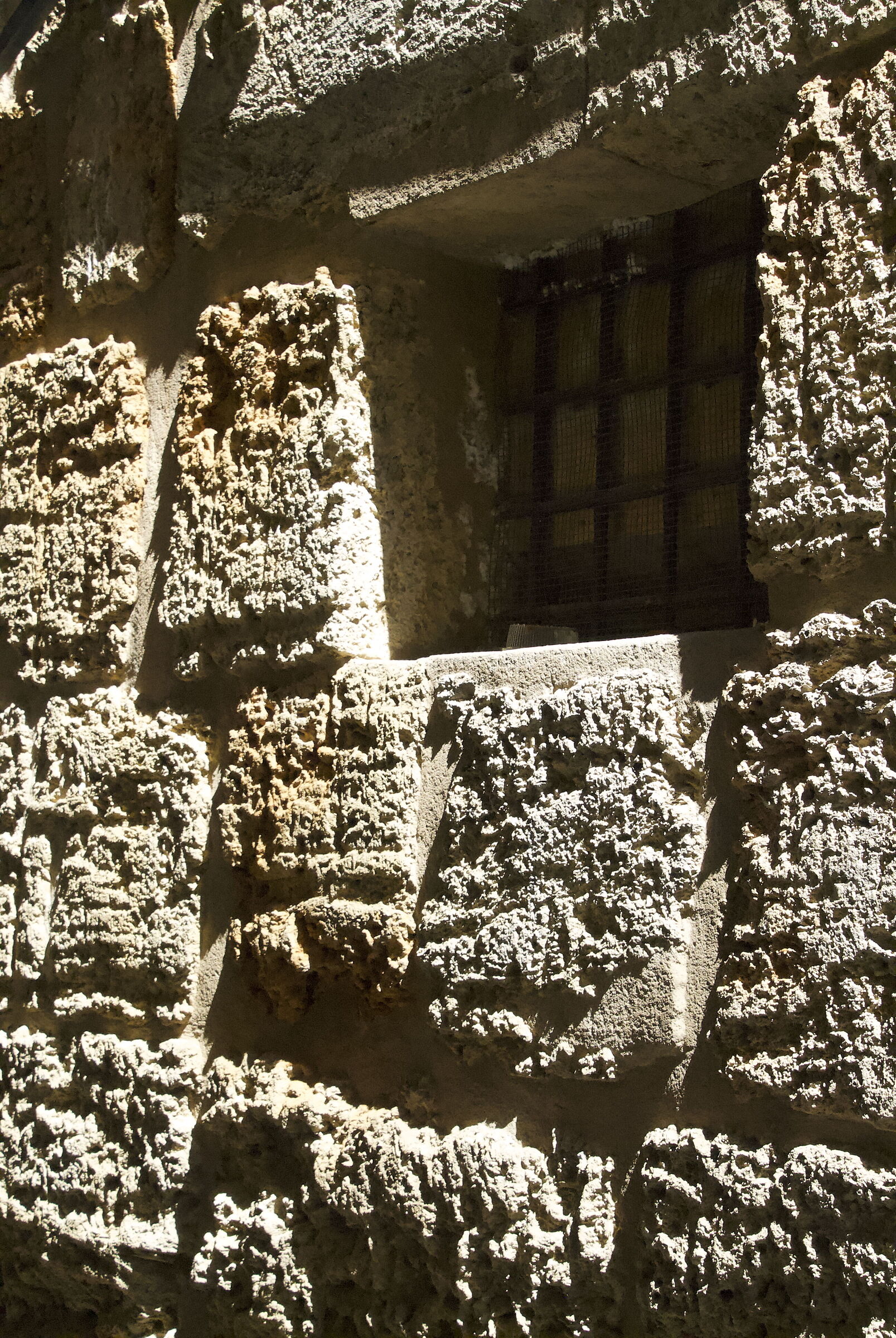 LIGHTS AND SHADOWS ON SANDSTONE WALL