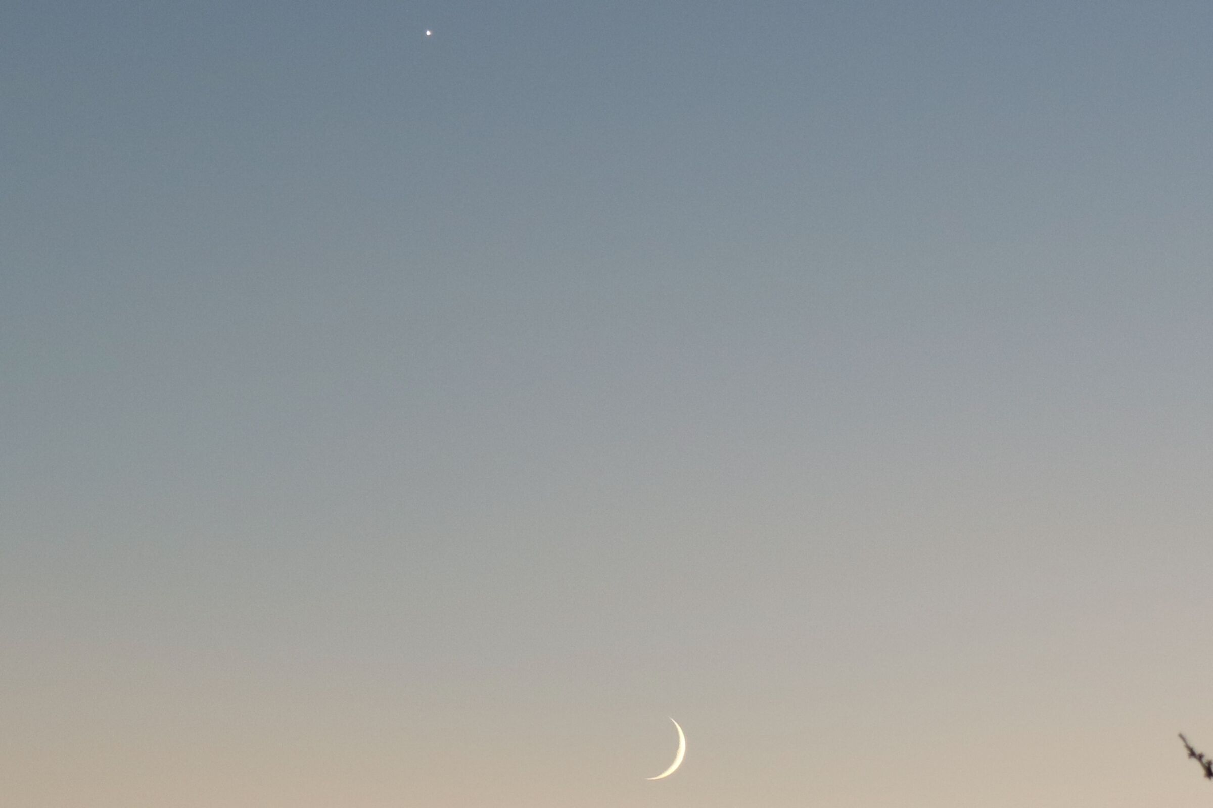 Stealing light from the sun. Moon and Venus in conjunction.