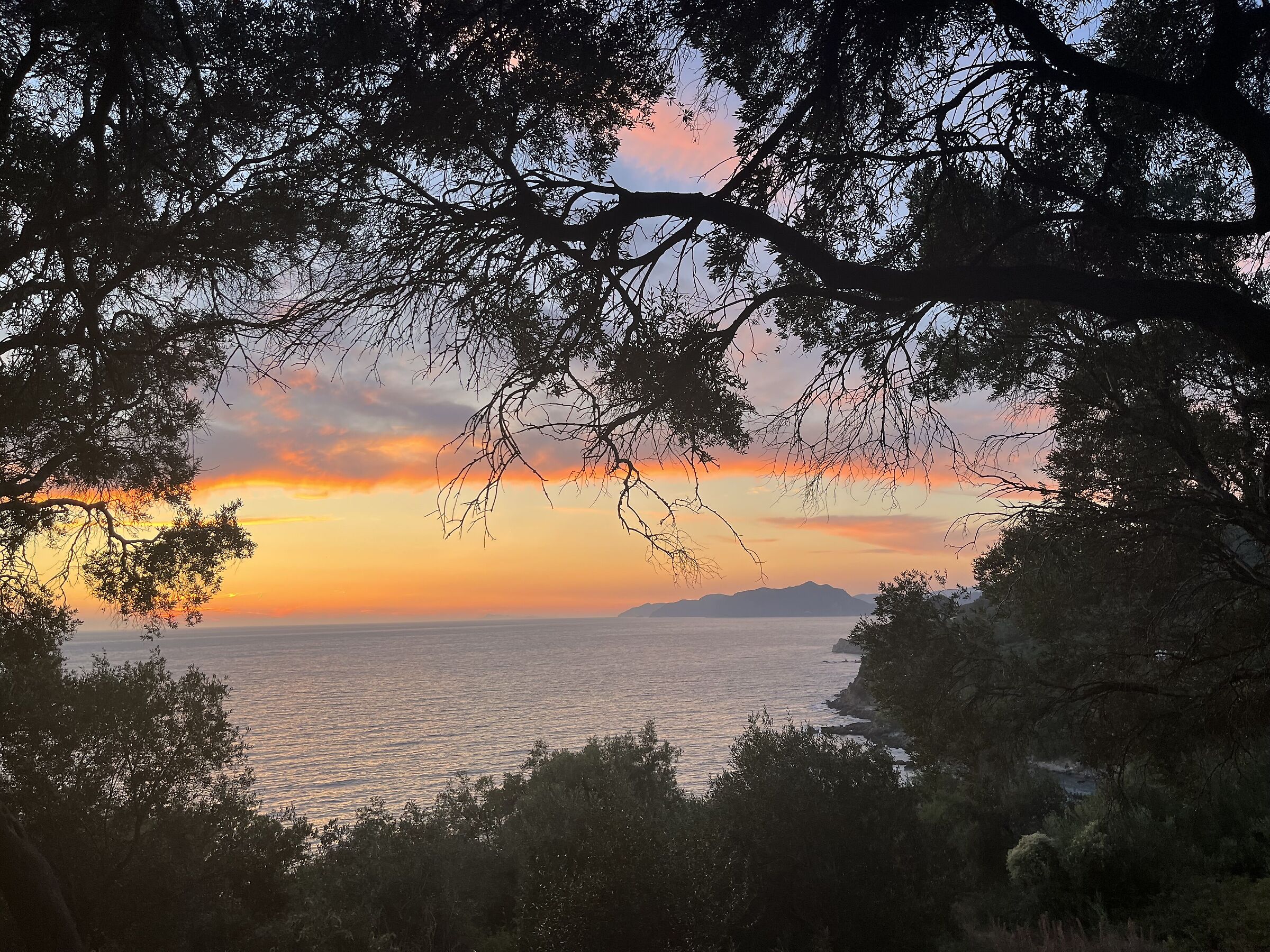 sunset over the mountains of Corfu