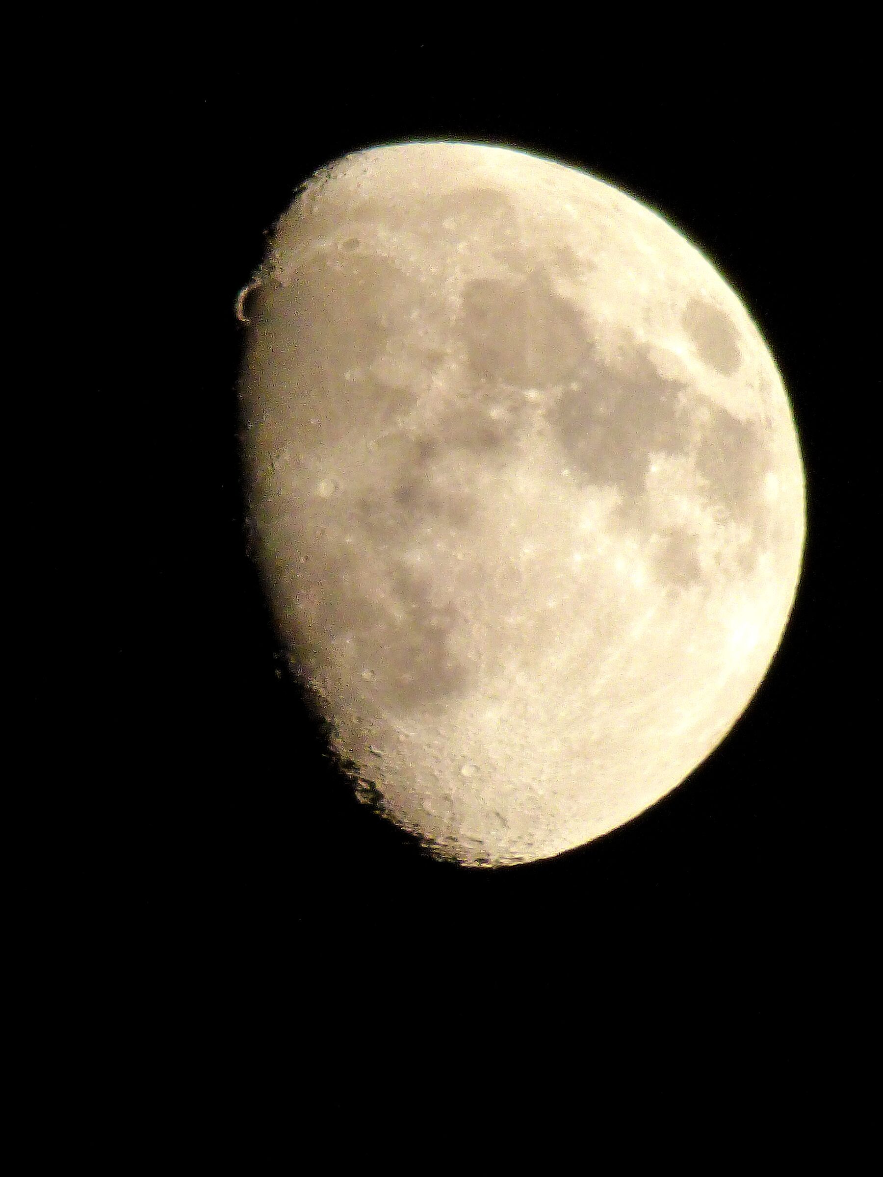 Moon a little more than half