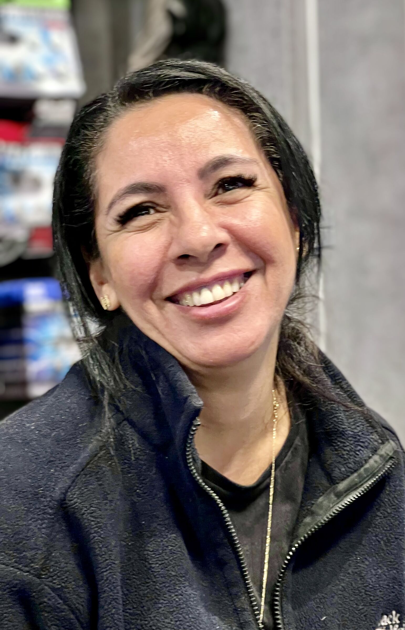 Radiant smile of a German cashier!