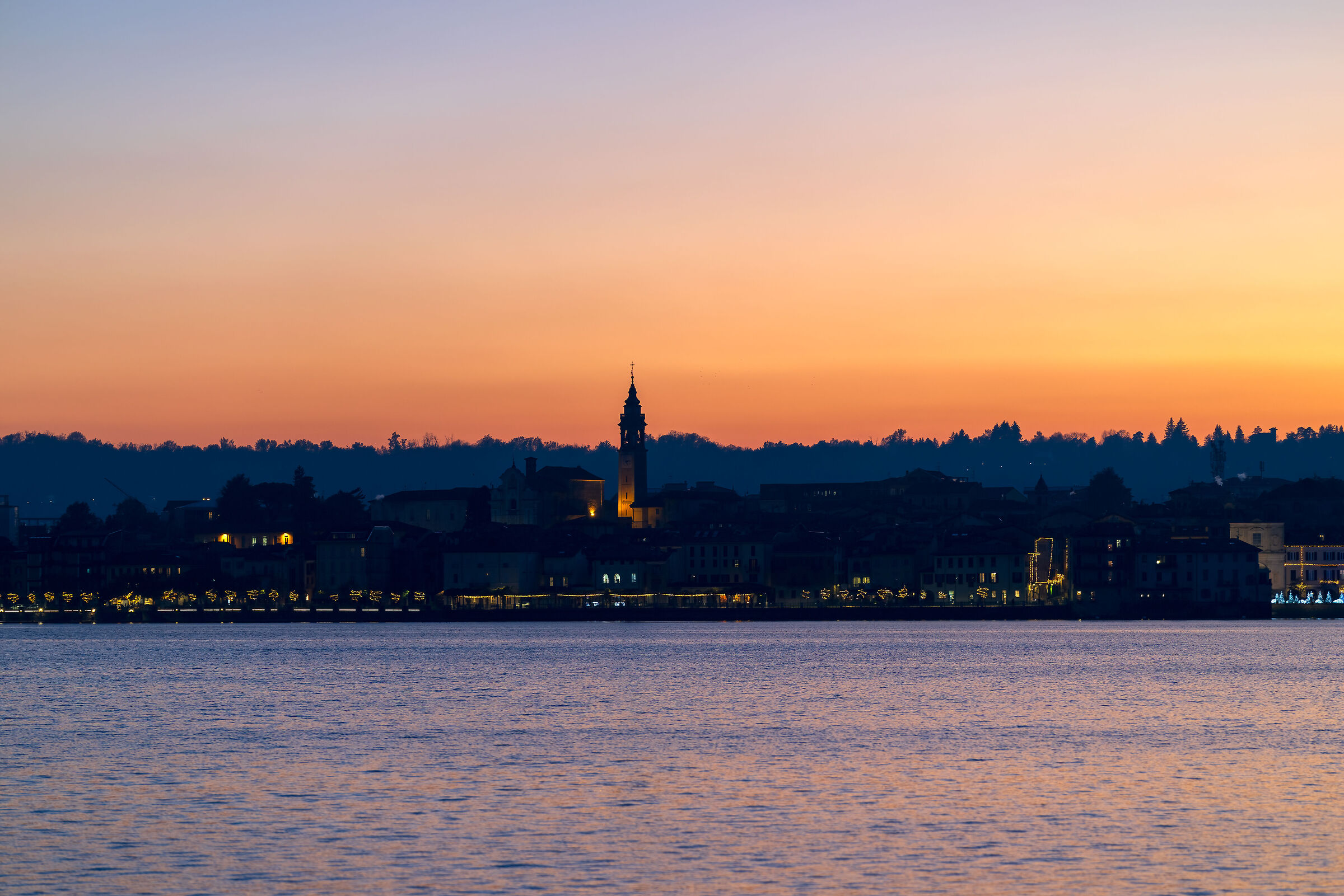 A beautiful winter sky over Arona seen from Angera