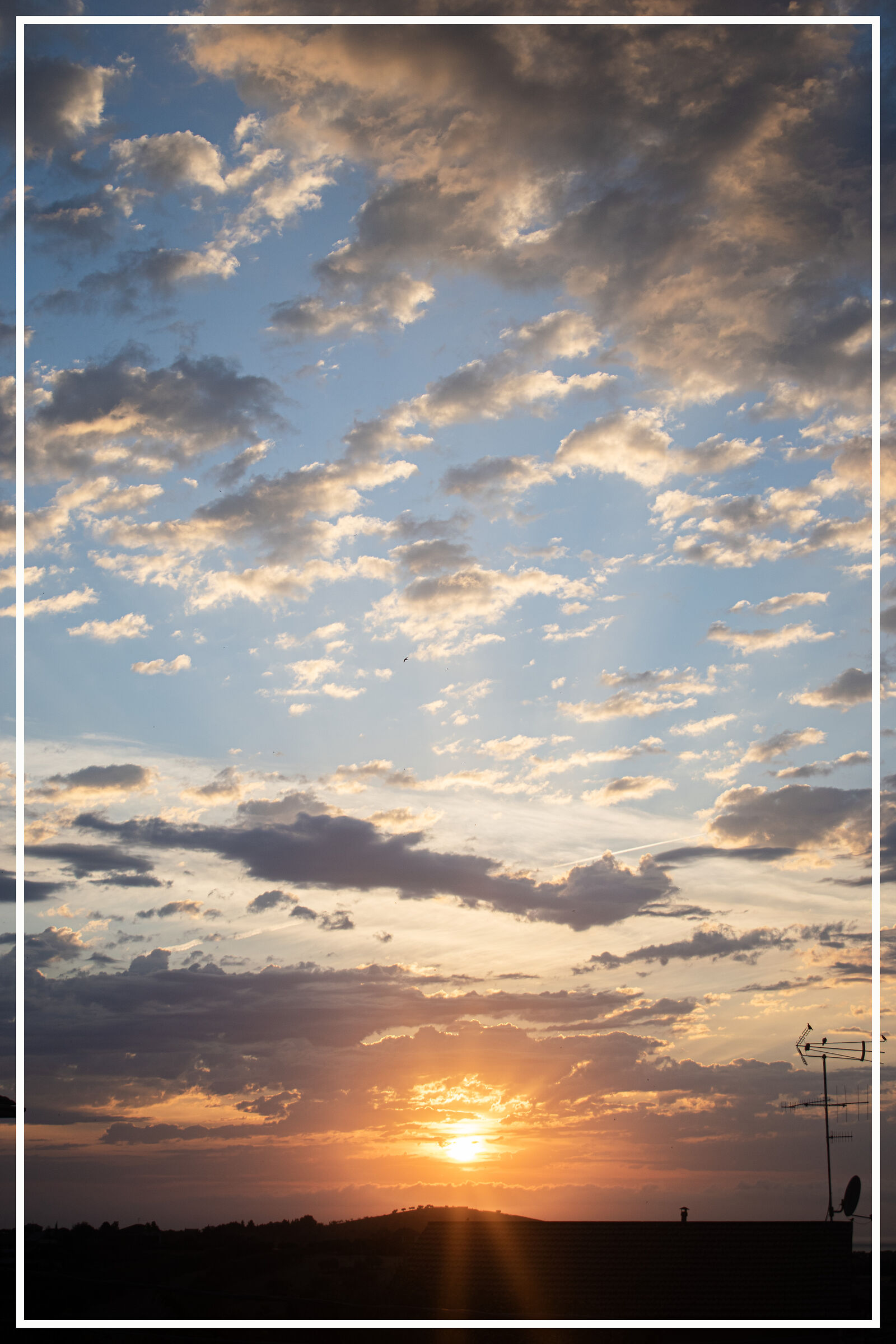 A SUNRISE WITH THE SKY IN SHEEP