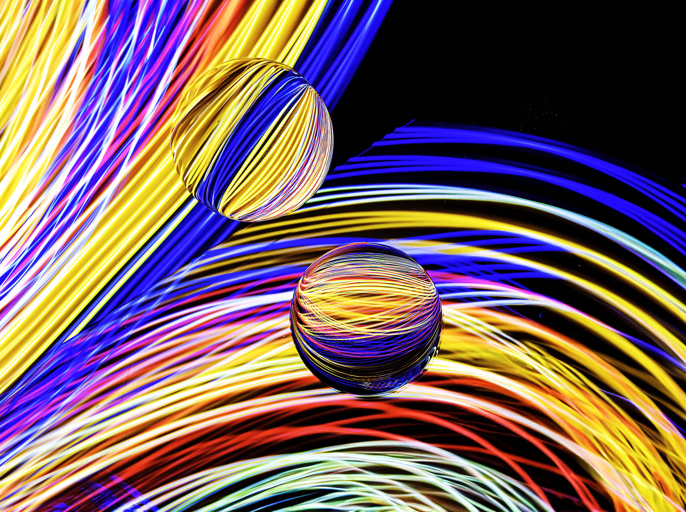 The two spheres in motion