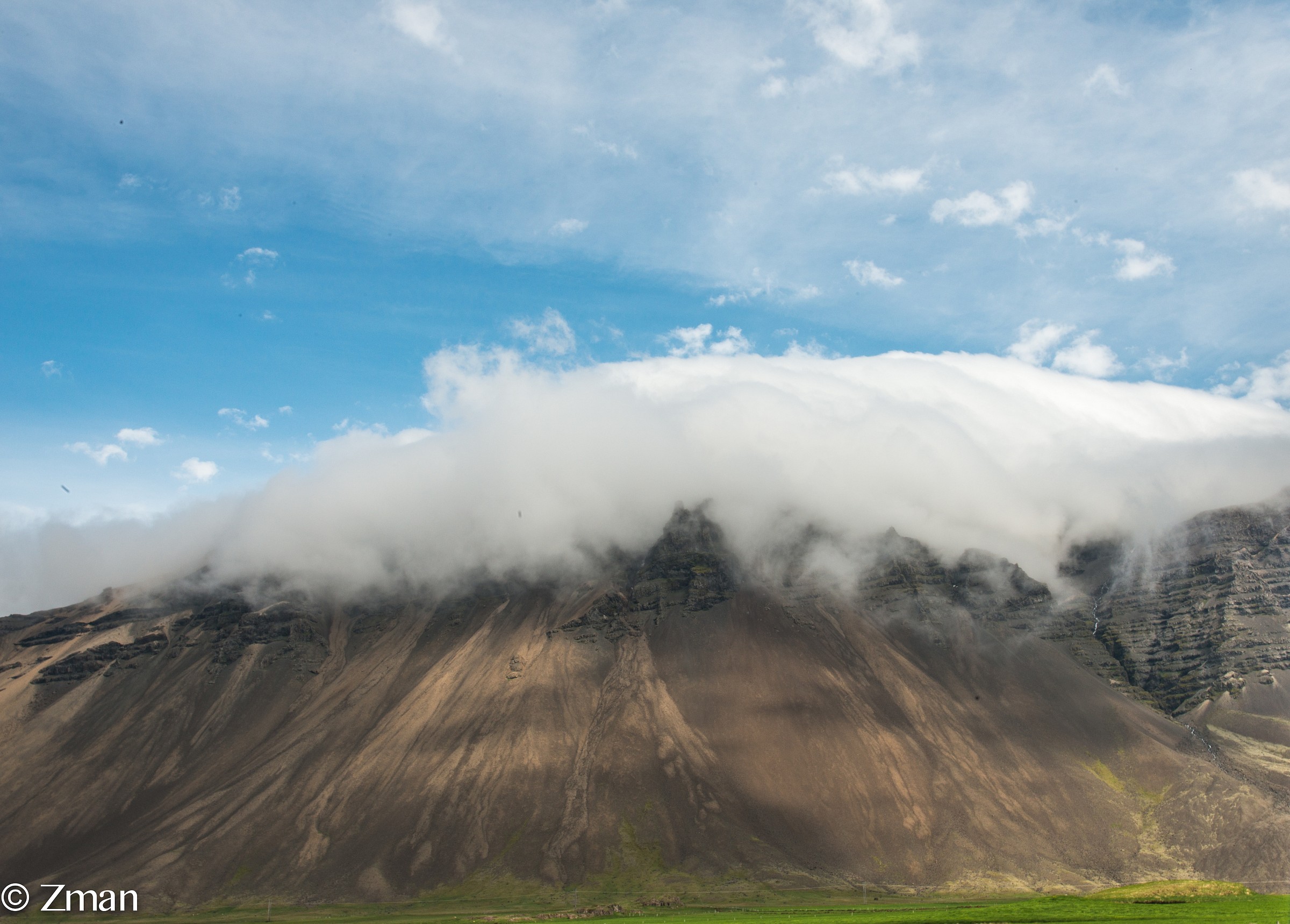 The Volcano is Being Cooled bY a Cloud