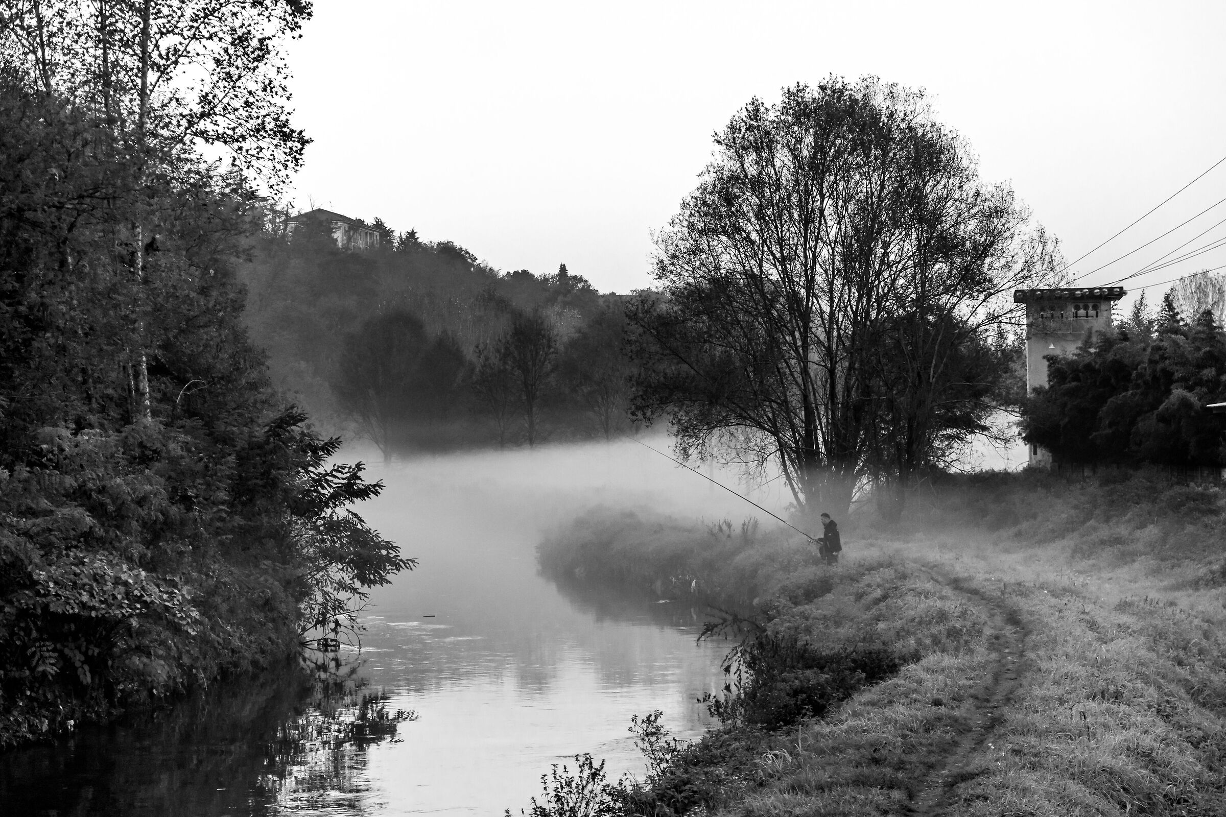 la nebbia e il pescatore