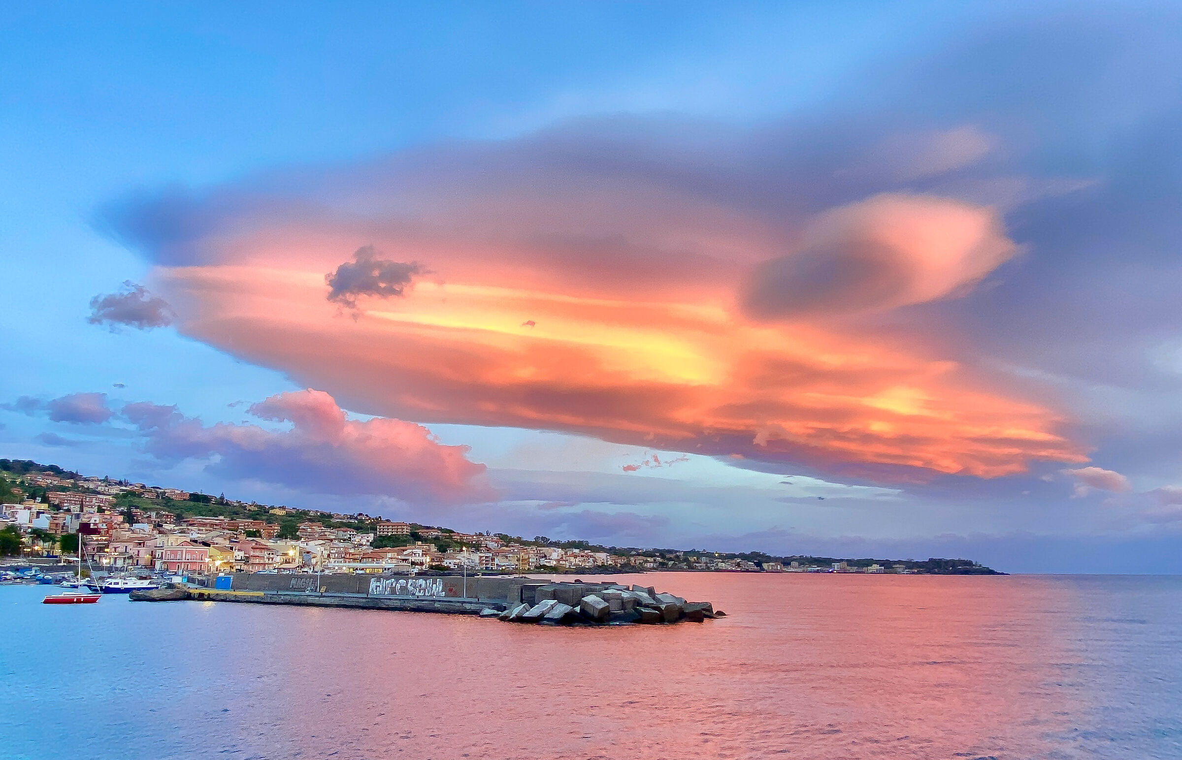 Lenticular cloud over Aci Trezza