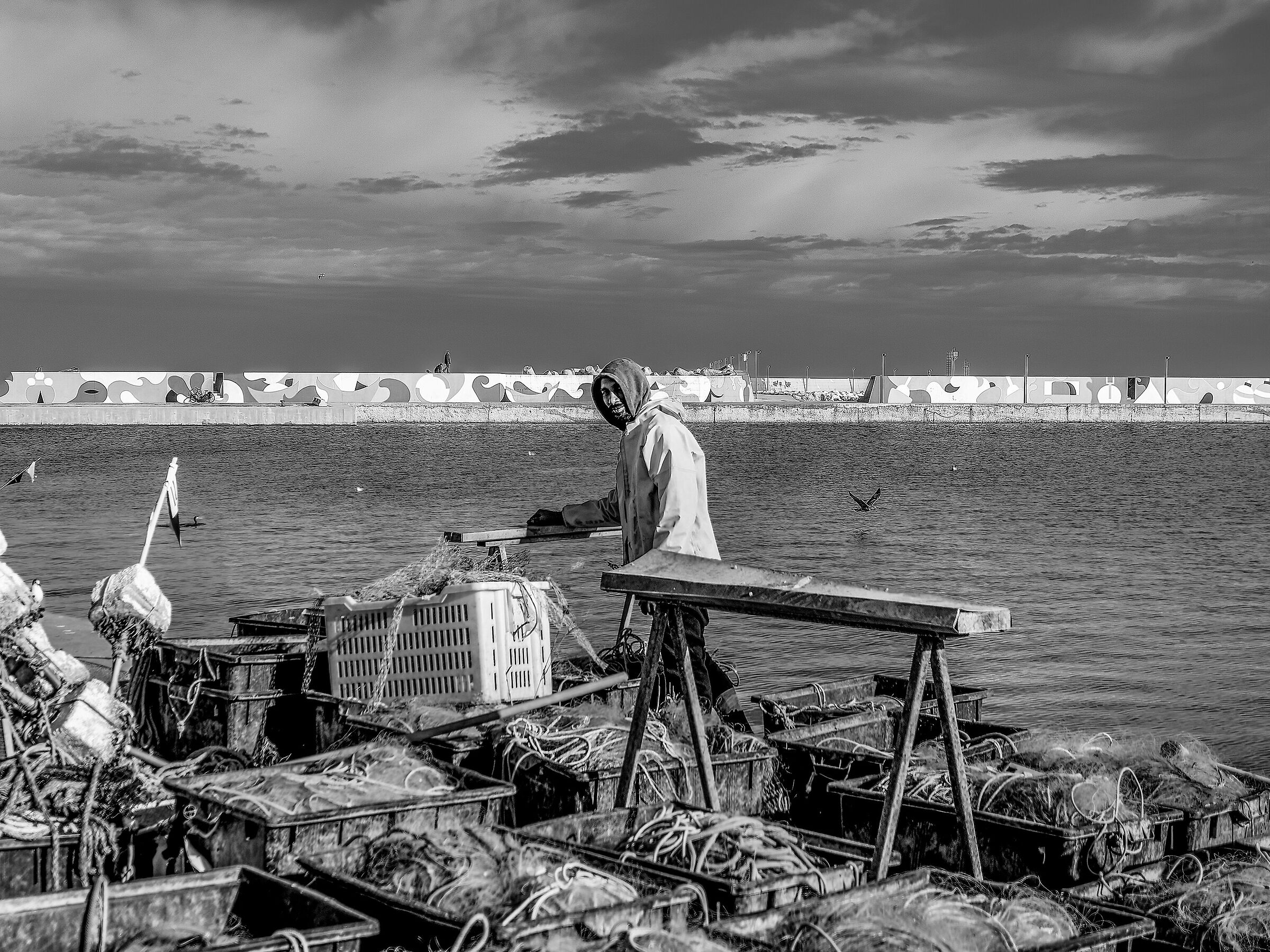 Fisherman at work on the pier.
