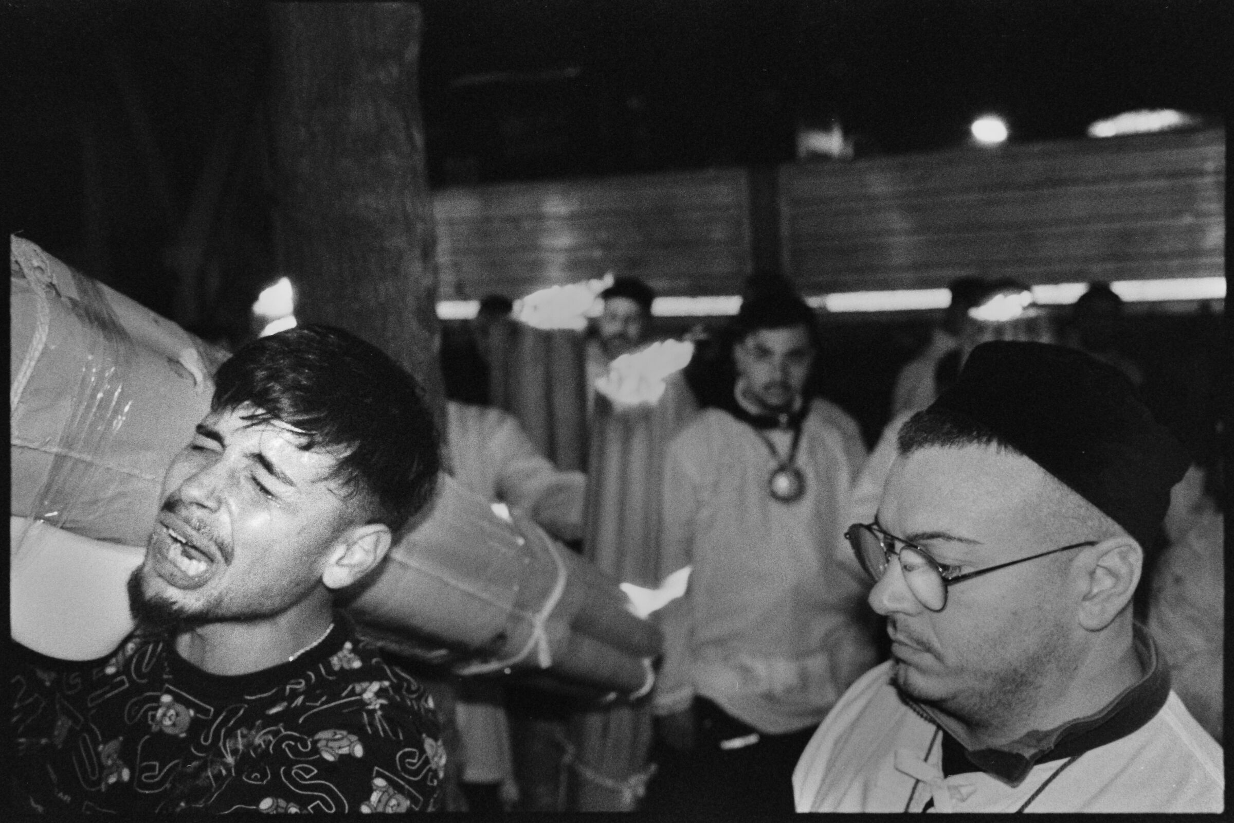 Devotee prays to the saint for a miracle on his sick mother