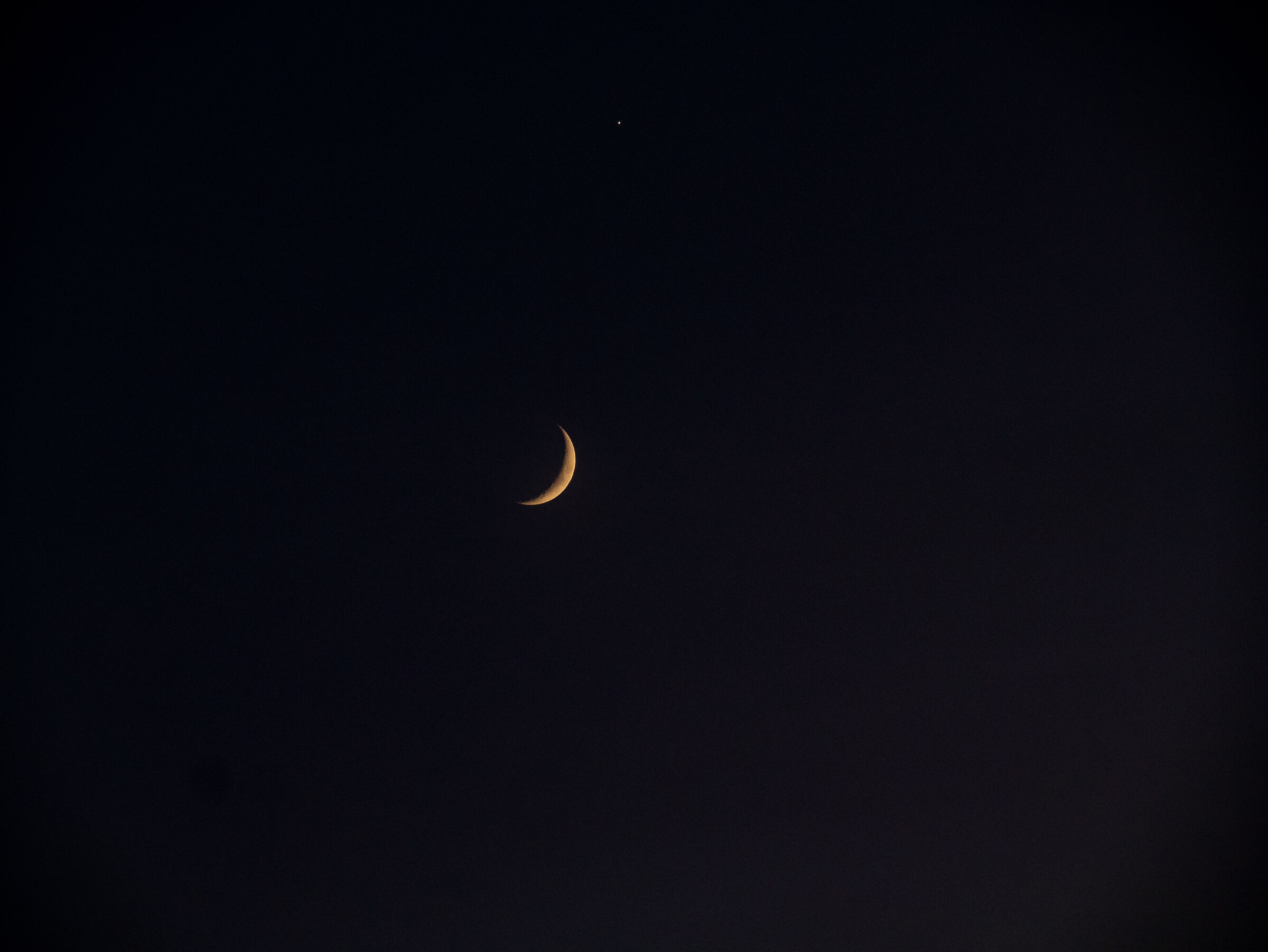 A quarter moon and little star...