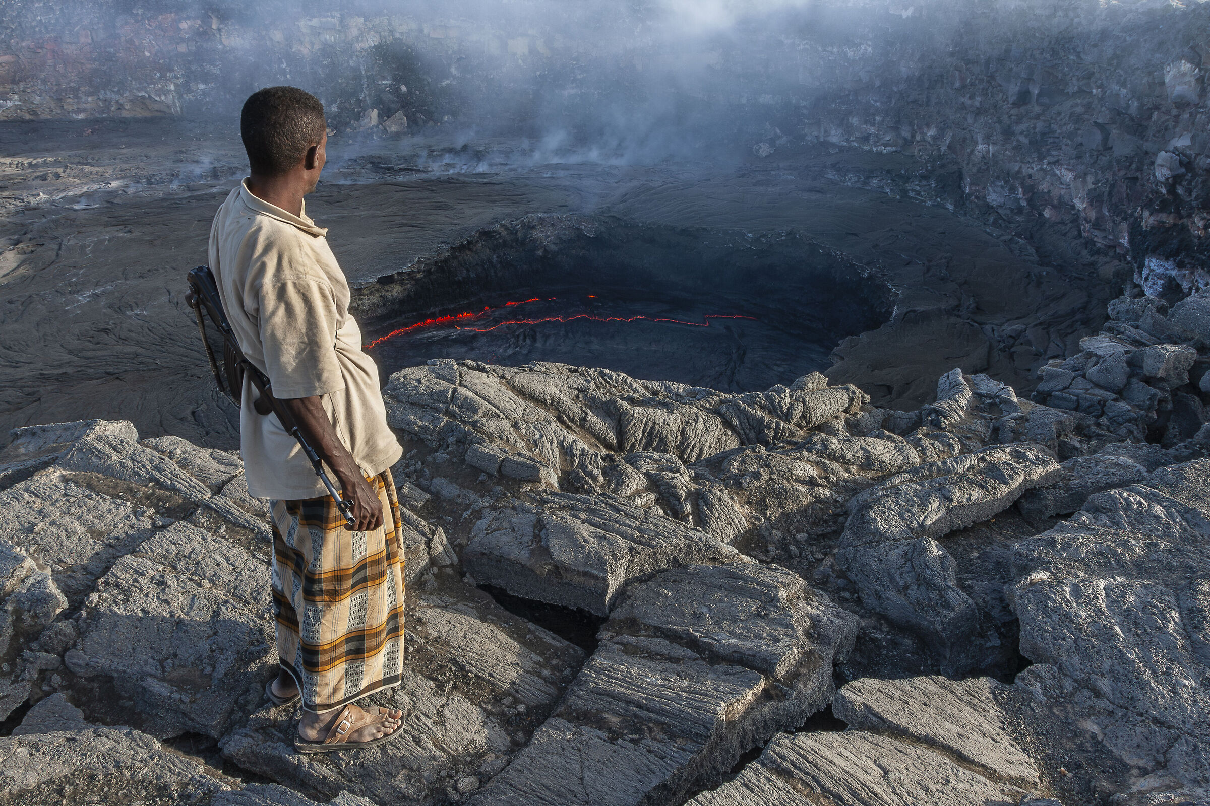 The guide and the Erta Ale volcano