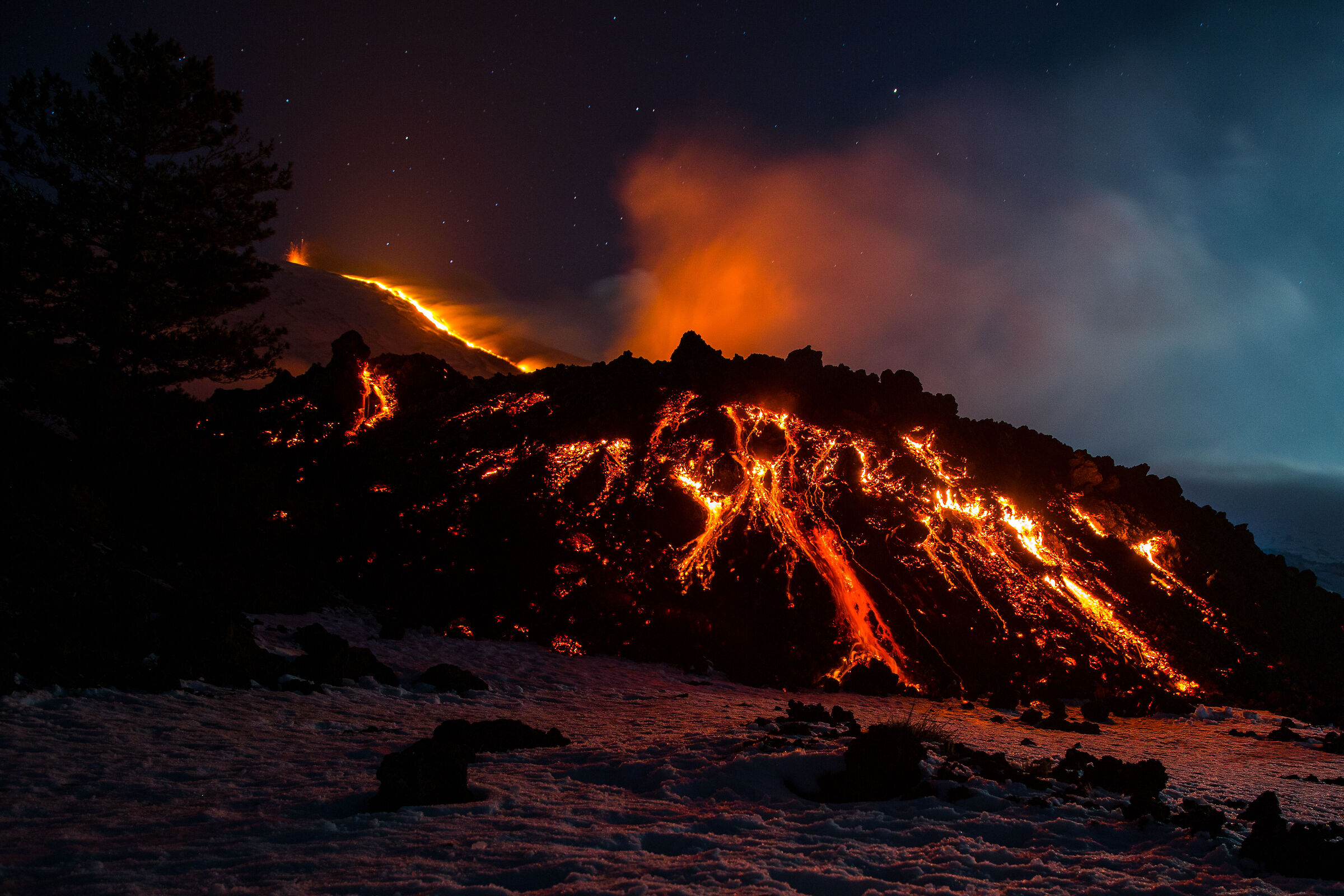 At the front of the lava flow.