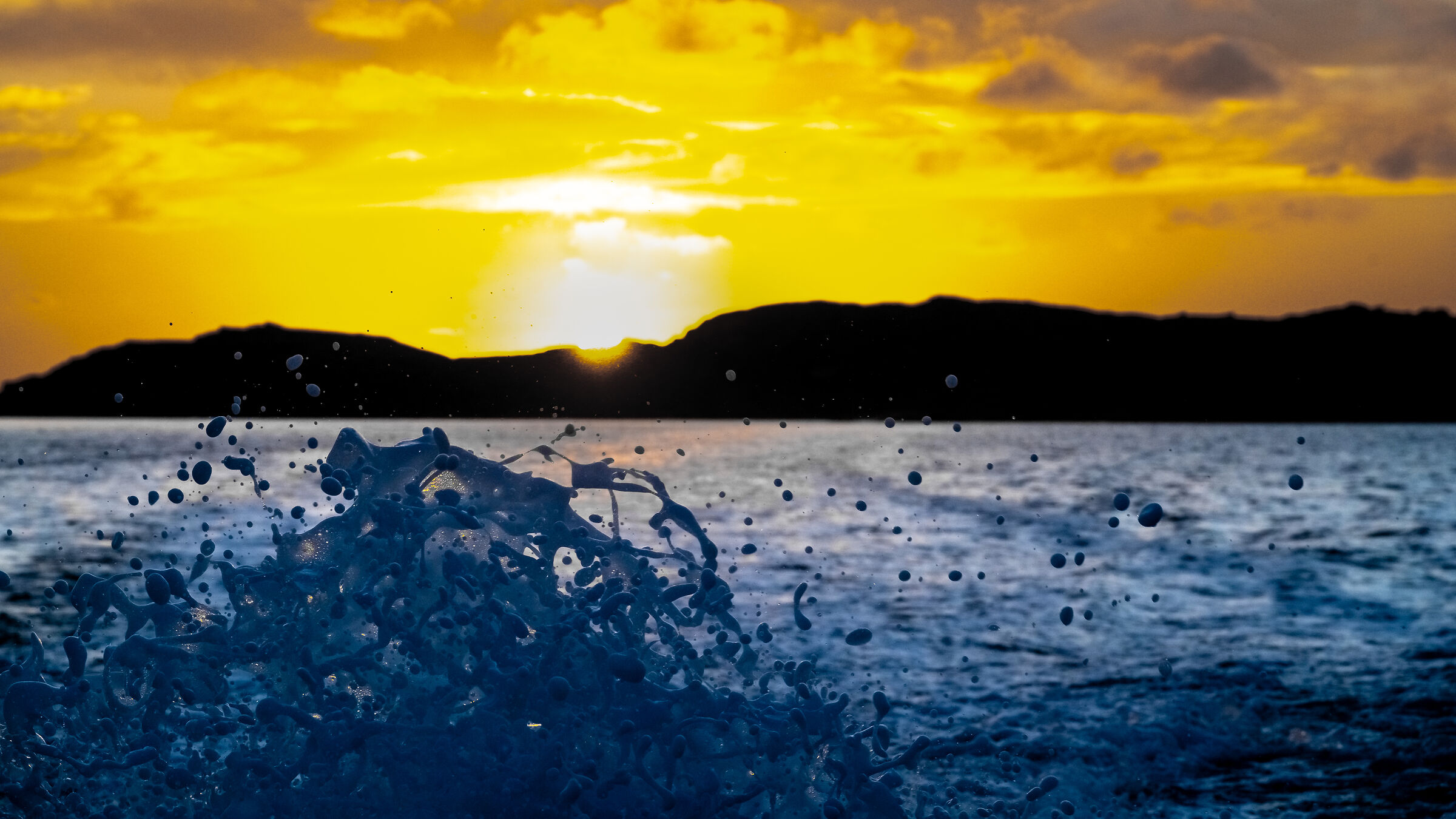 Leaving at sunset Väderöarna Island on a boat