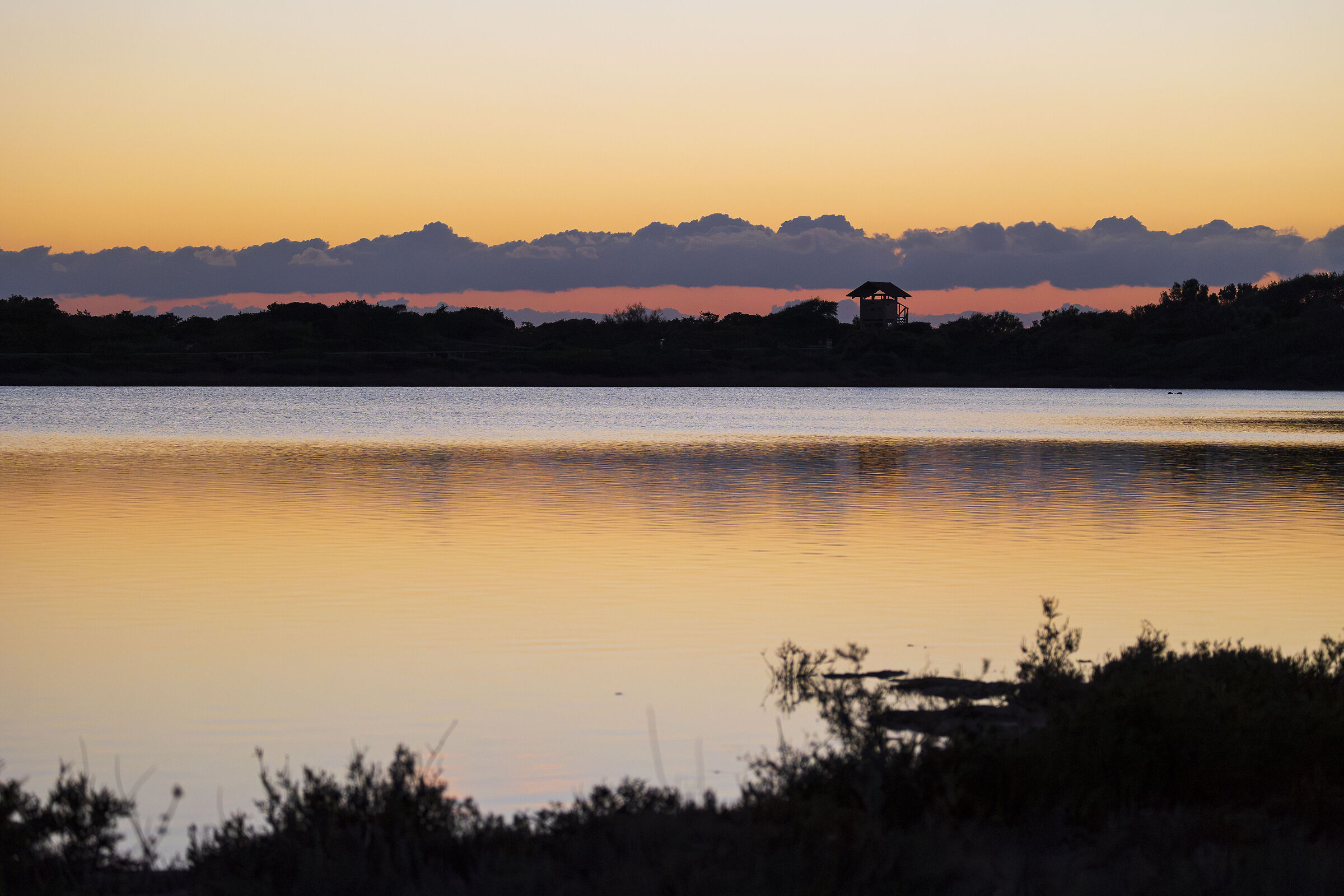 Sunset at the Salina dei Monaci