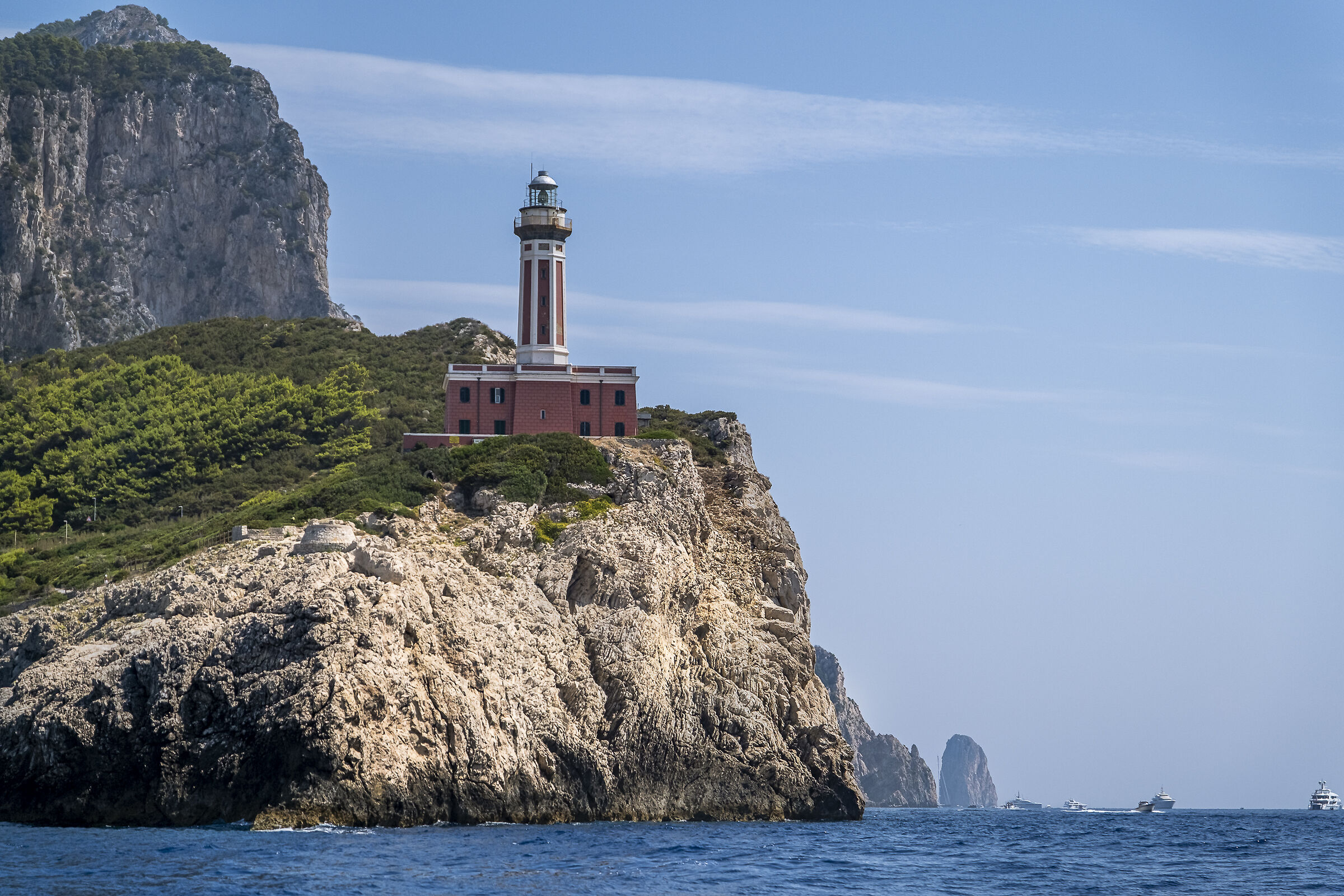 Capri Punta Carena Lighthouse with Faraglioni in the backgro...