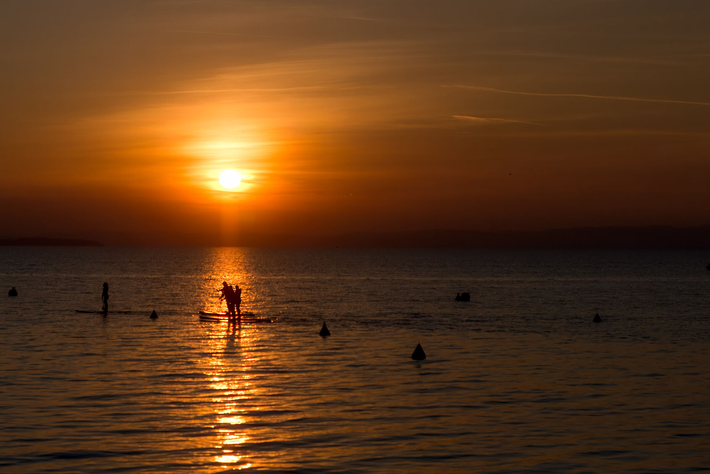 Stand Up Paddle at sunset on the Garda lake