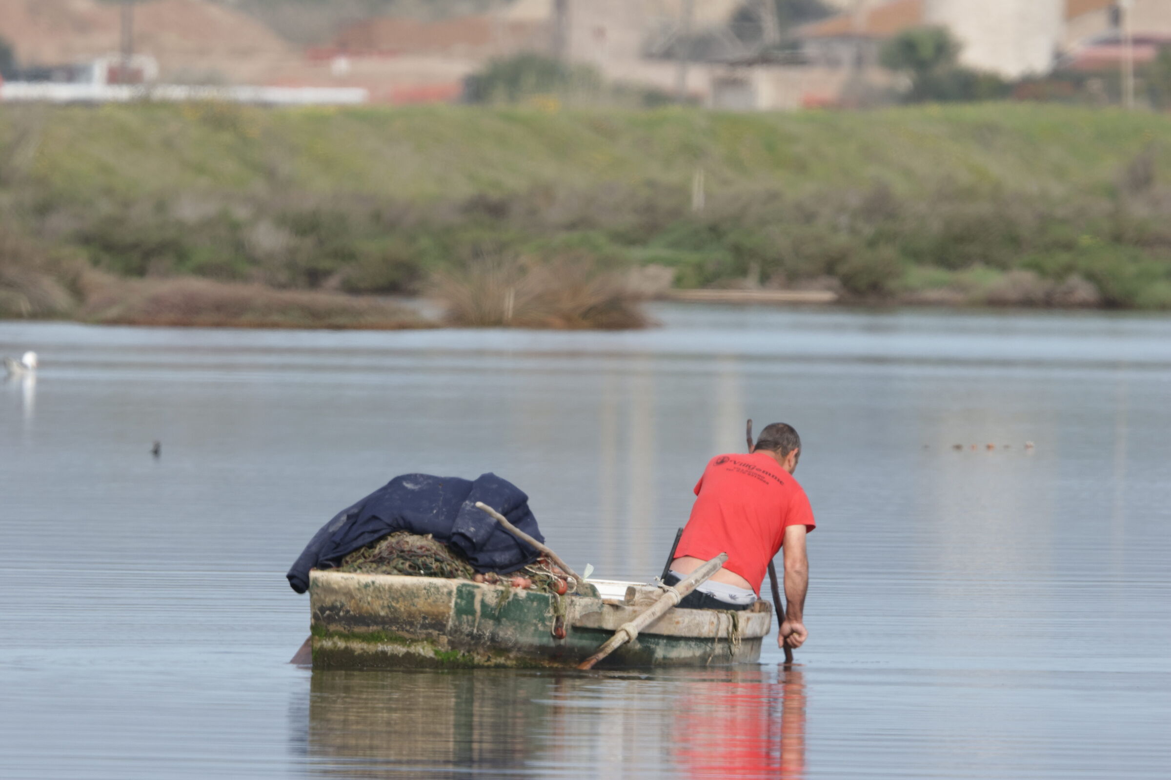 Fisherman in the lagoon