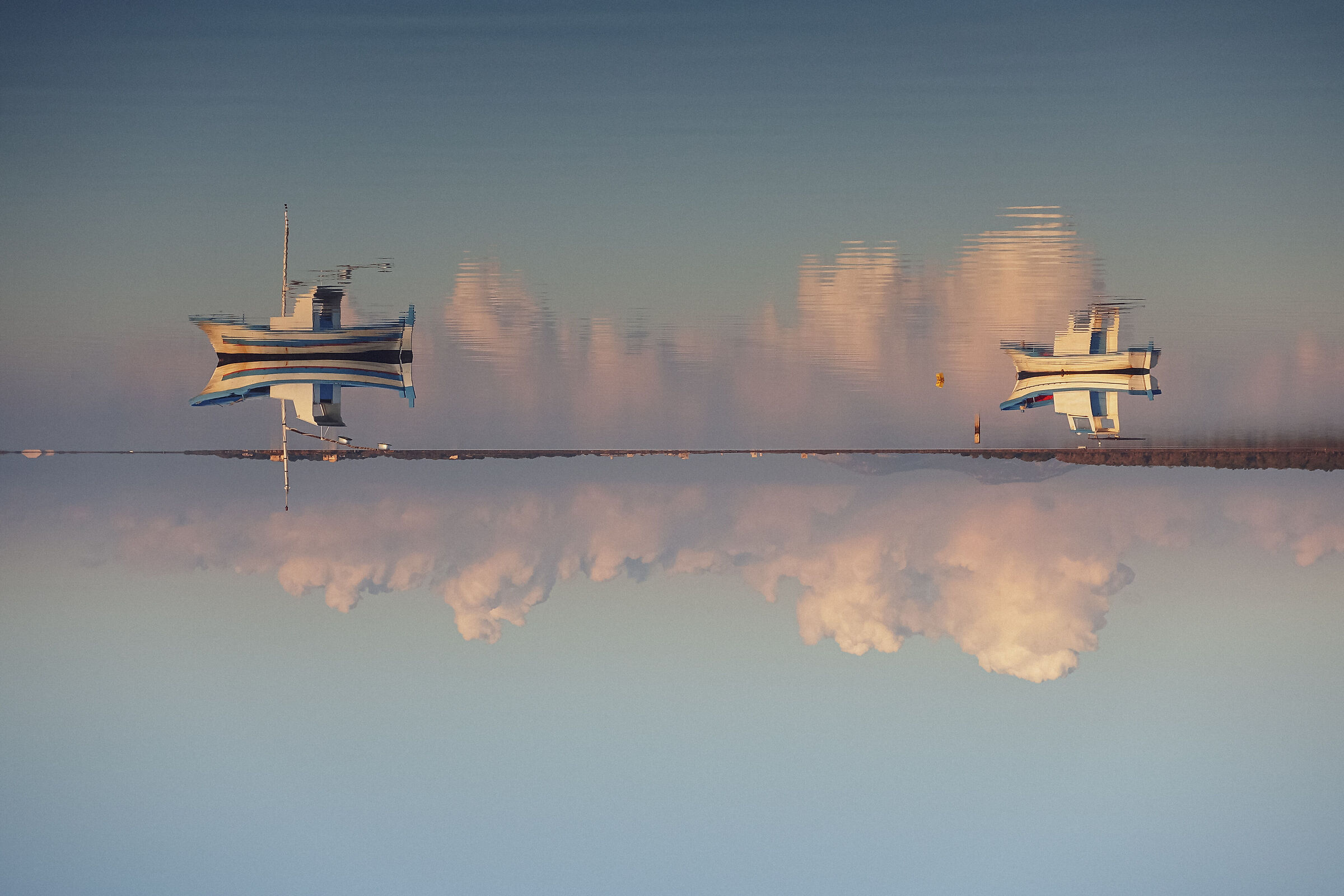 Boats float in the sky