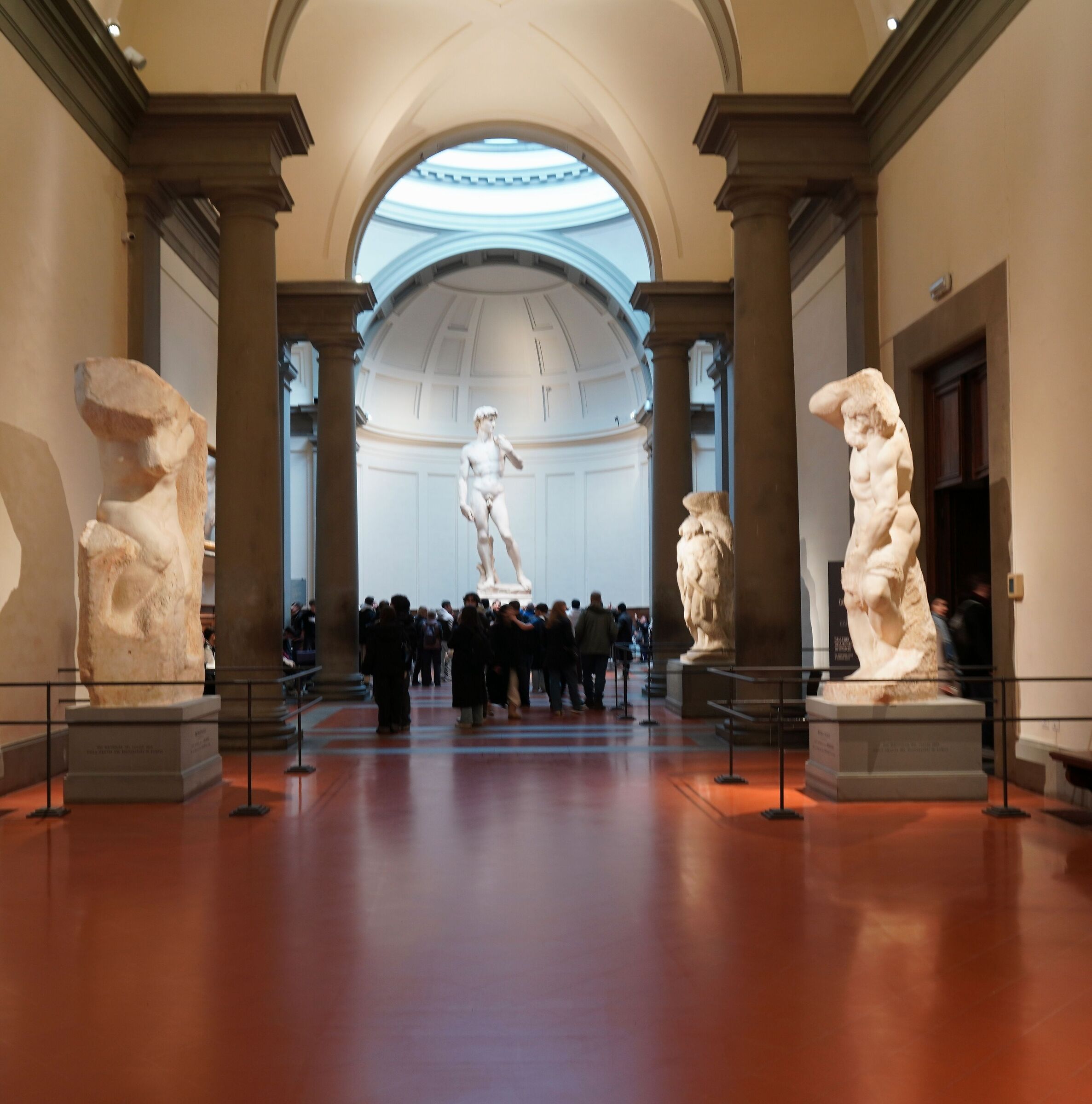 Michelangelo Hall of the Prisoners with David in the backgro...