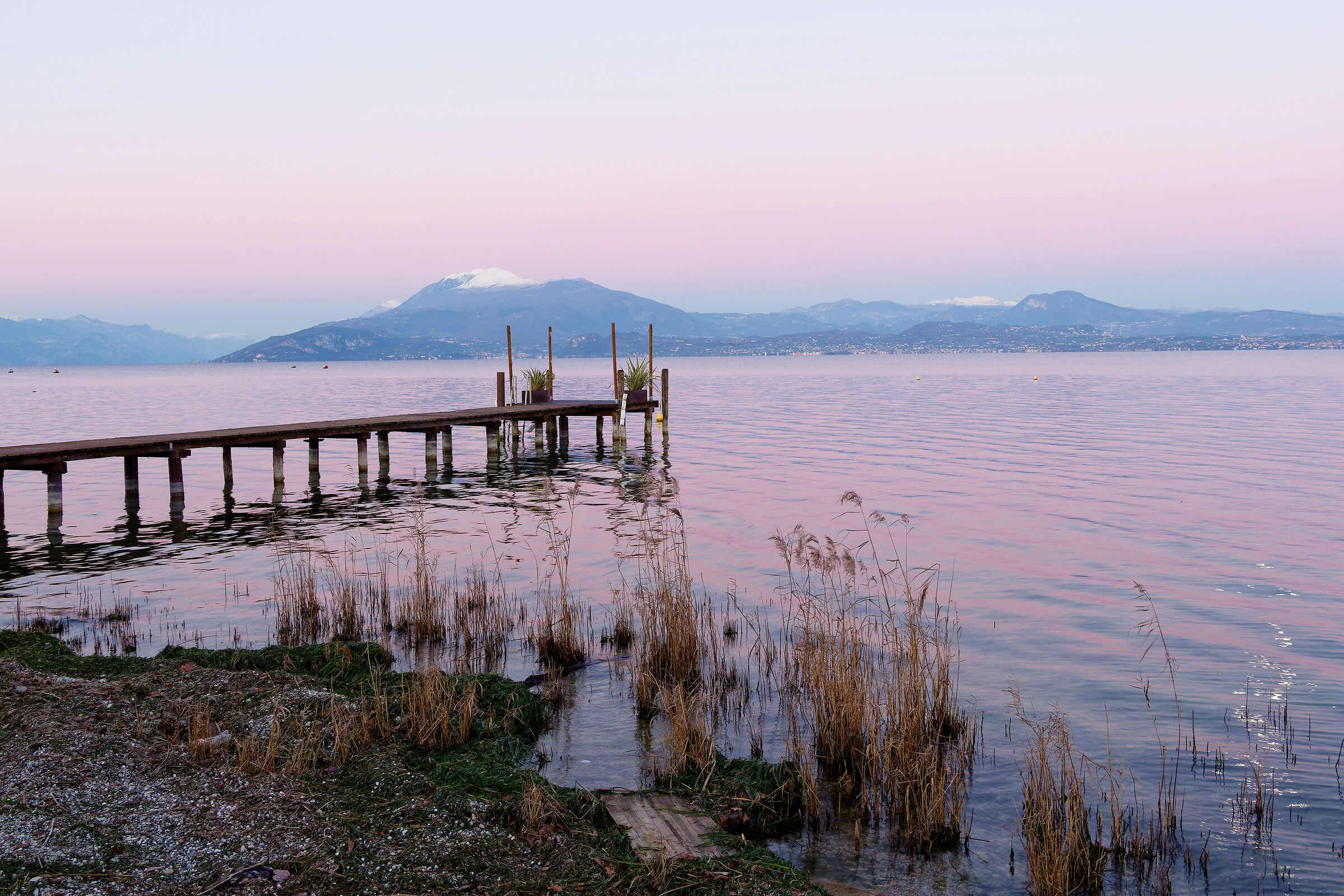 sunset with snow-capped Mount Baldo
