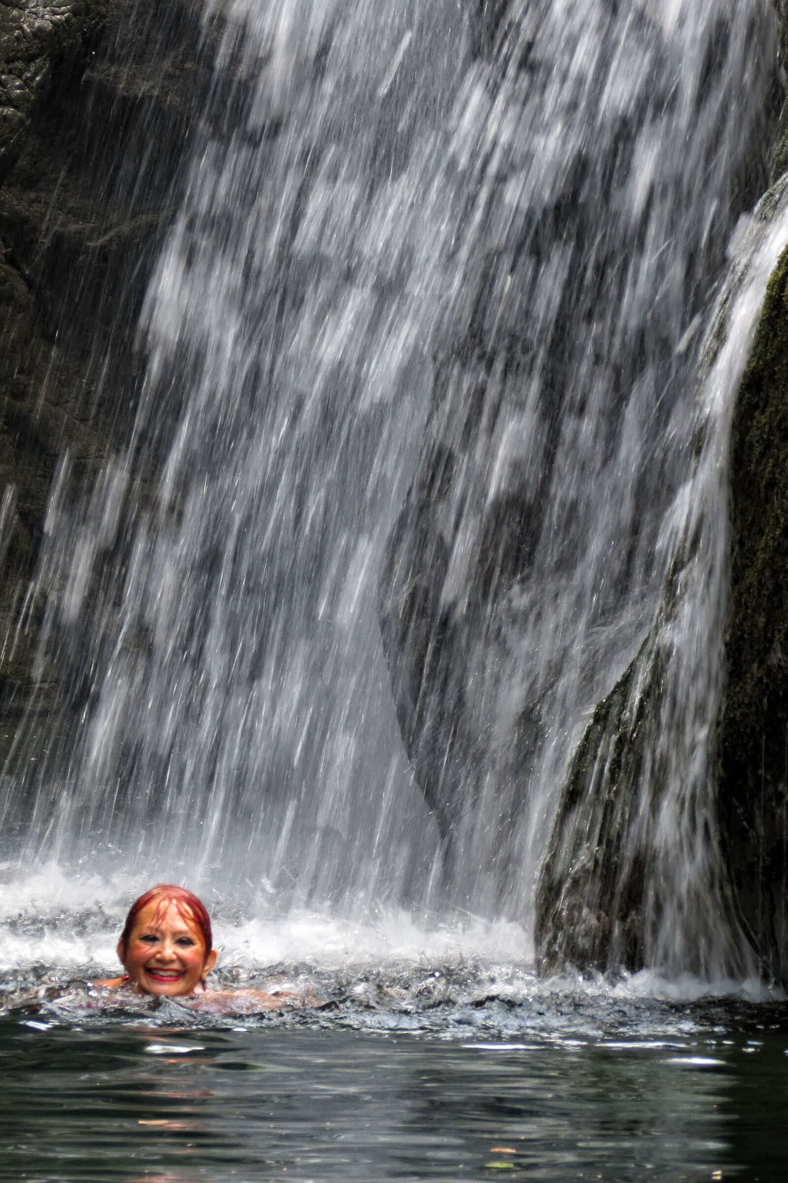 Under the canyon waterfall