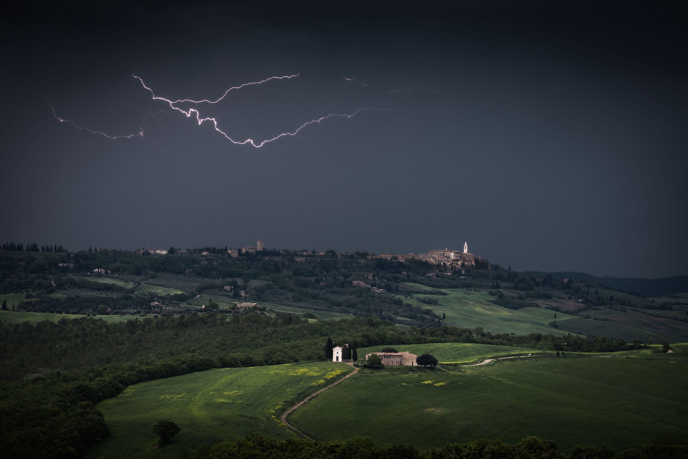 Thunderstorm at dusk over Pienza