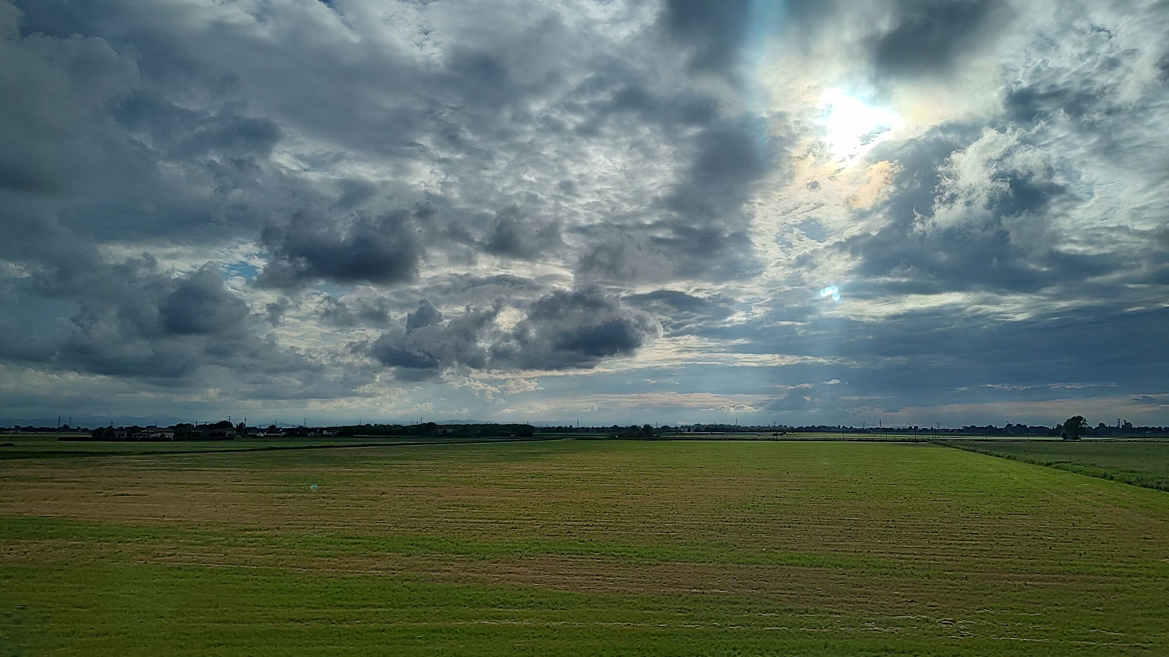 Fields and clouds as far as the eye can see