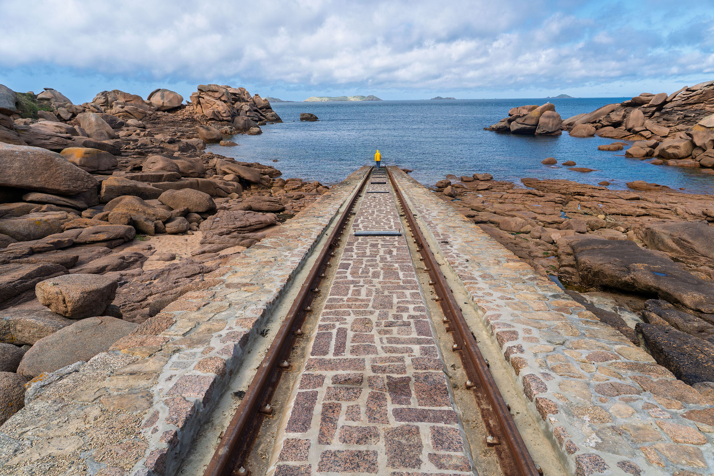 The man in the yellow raincoat