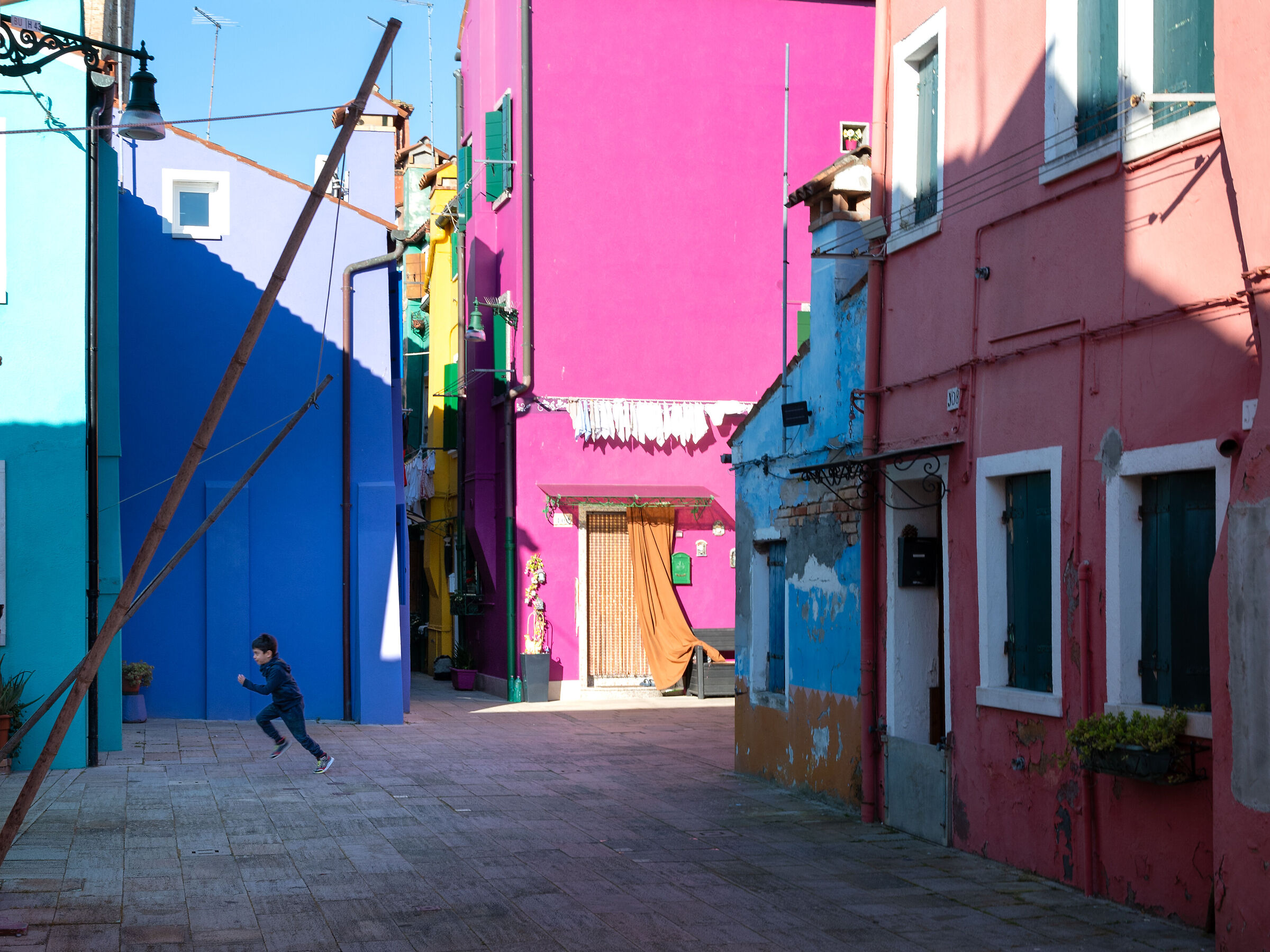 Running through the alleys of Burano