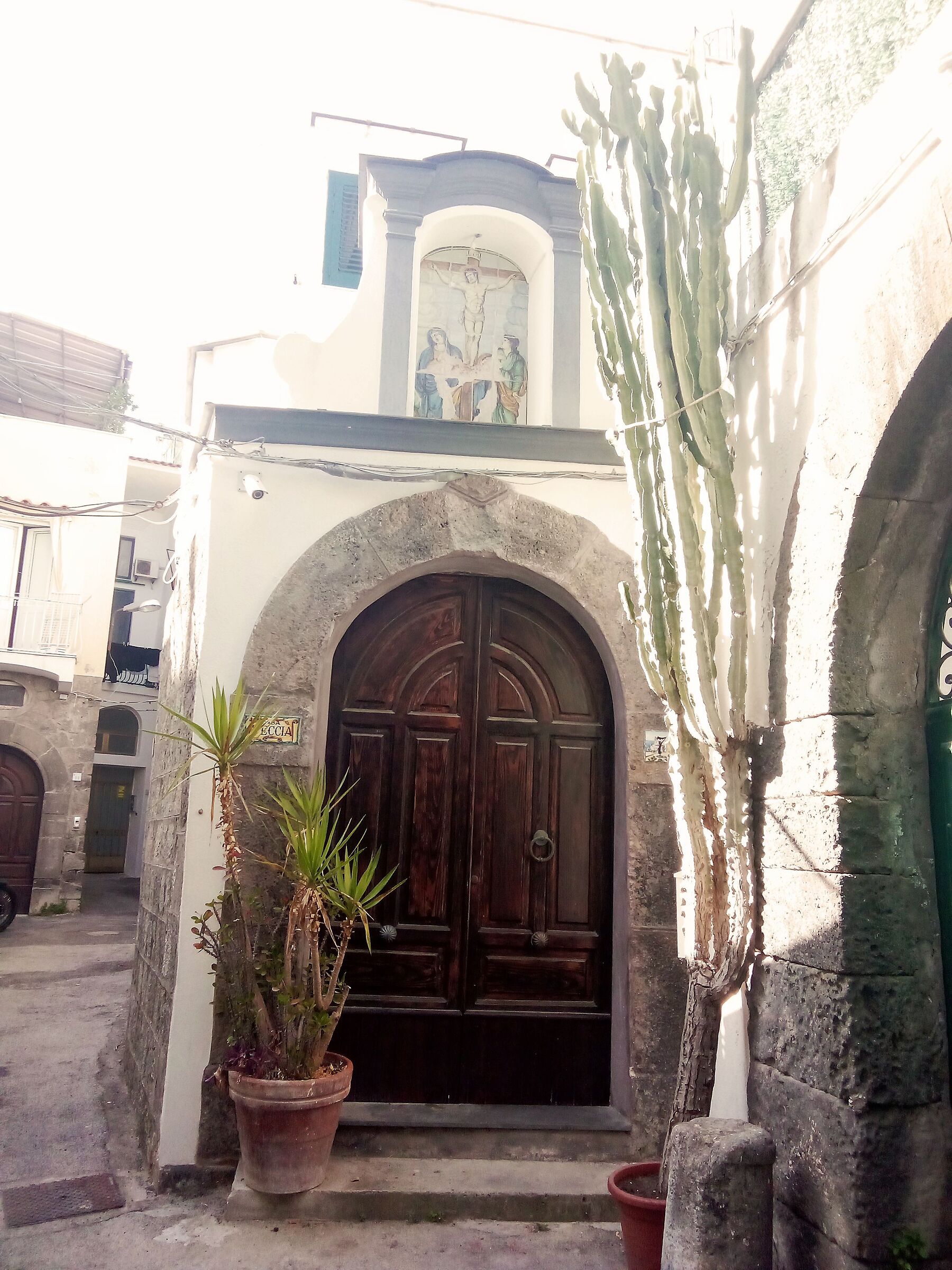 Forio ancient entrance with votive offering.