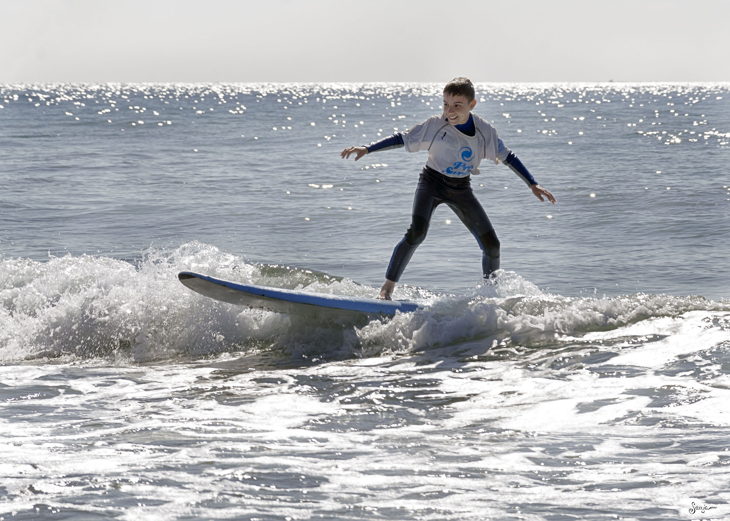 Happy little surfer