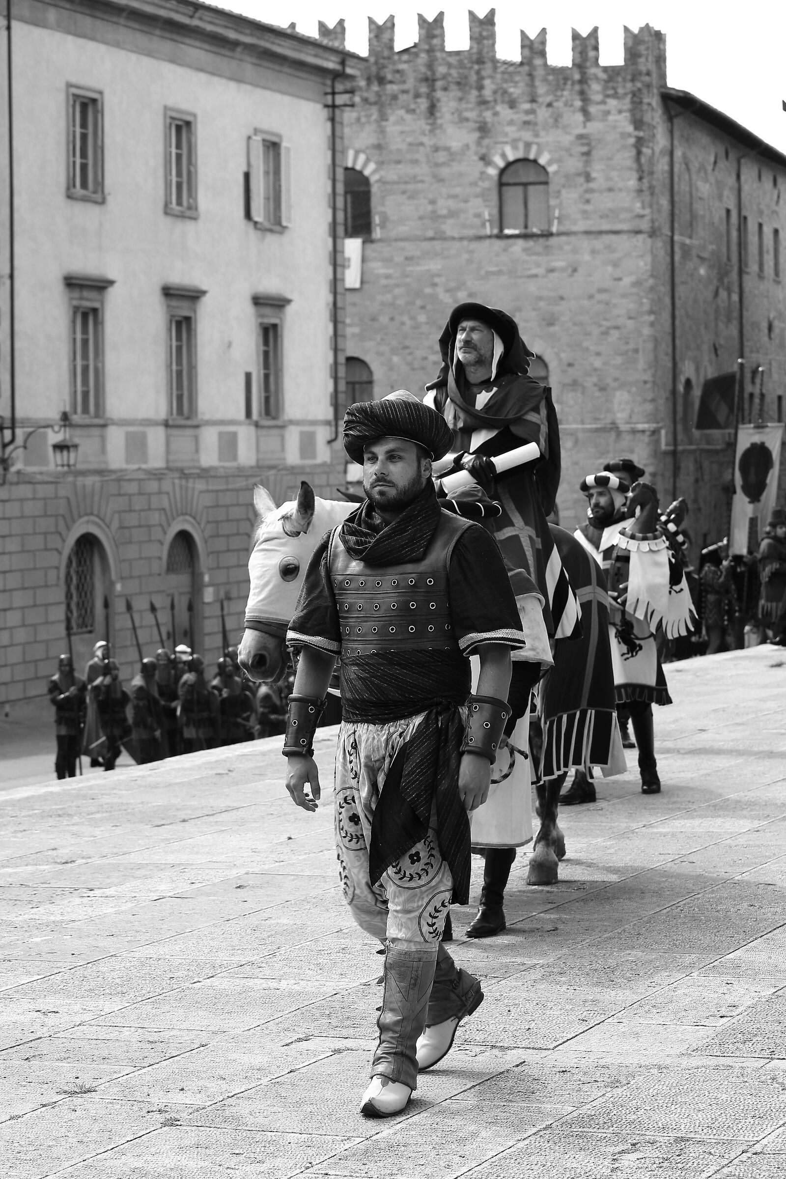 The procession and its figures