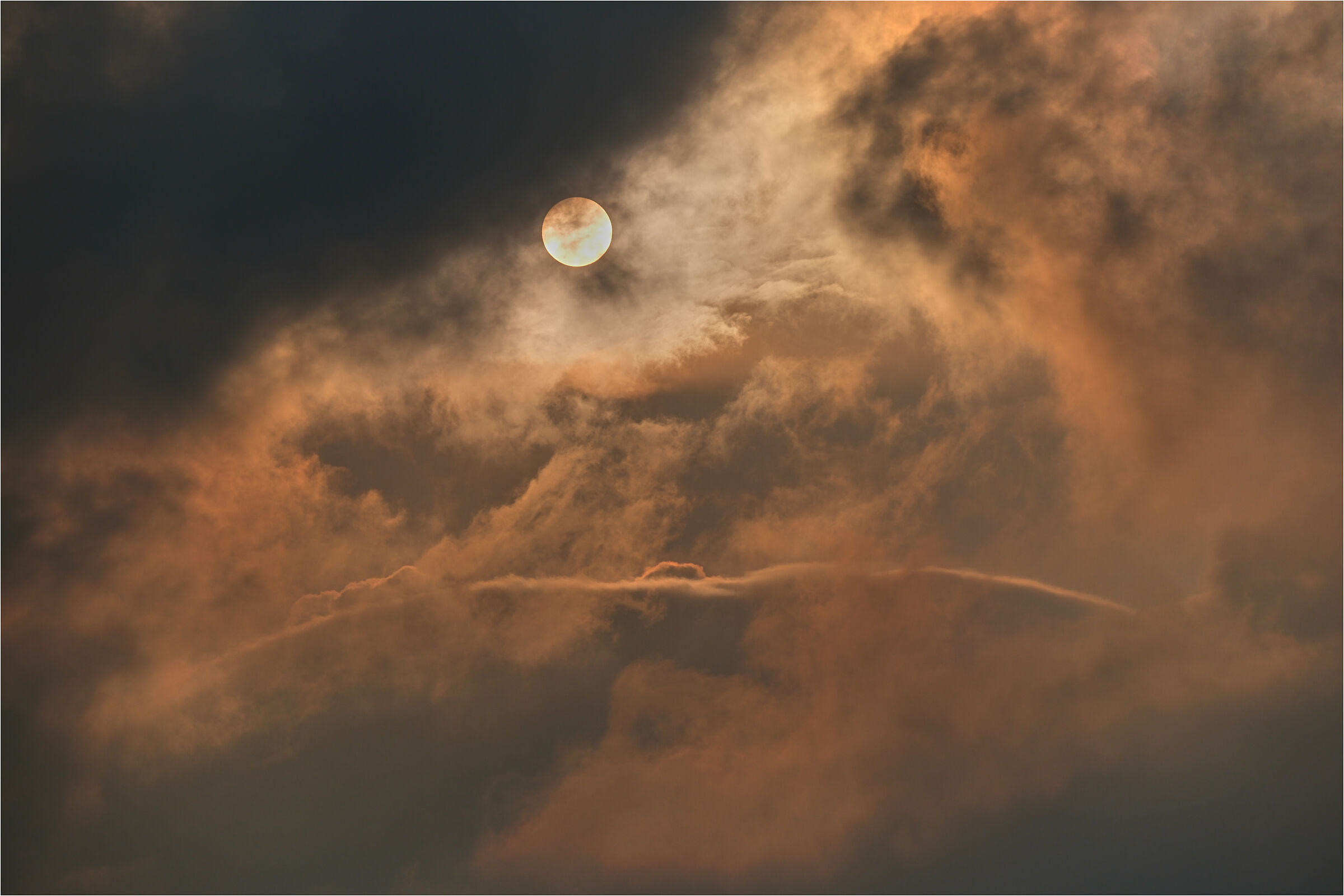 -between sun and clouds-