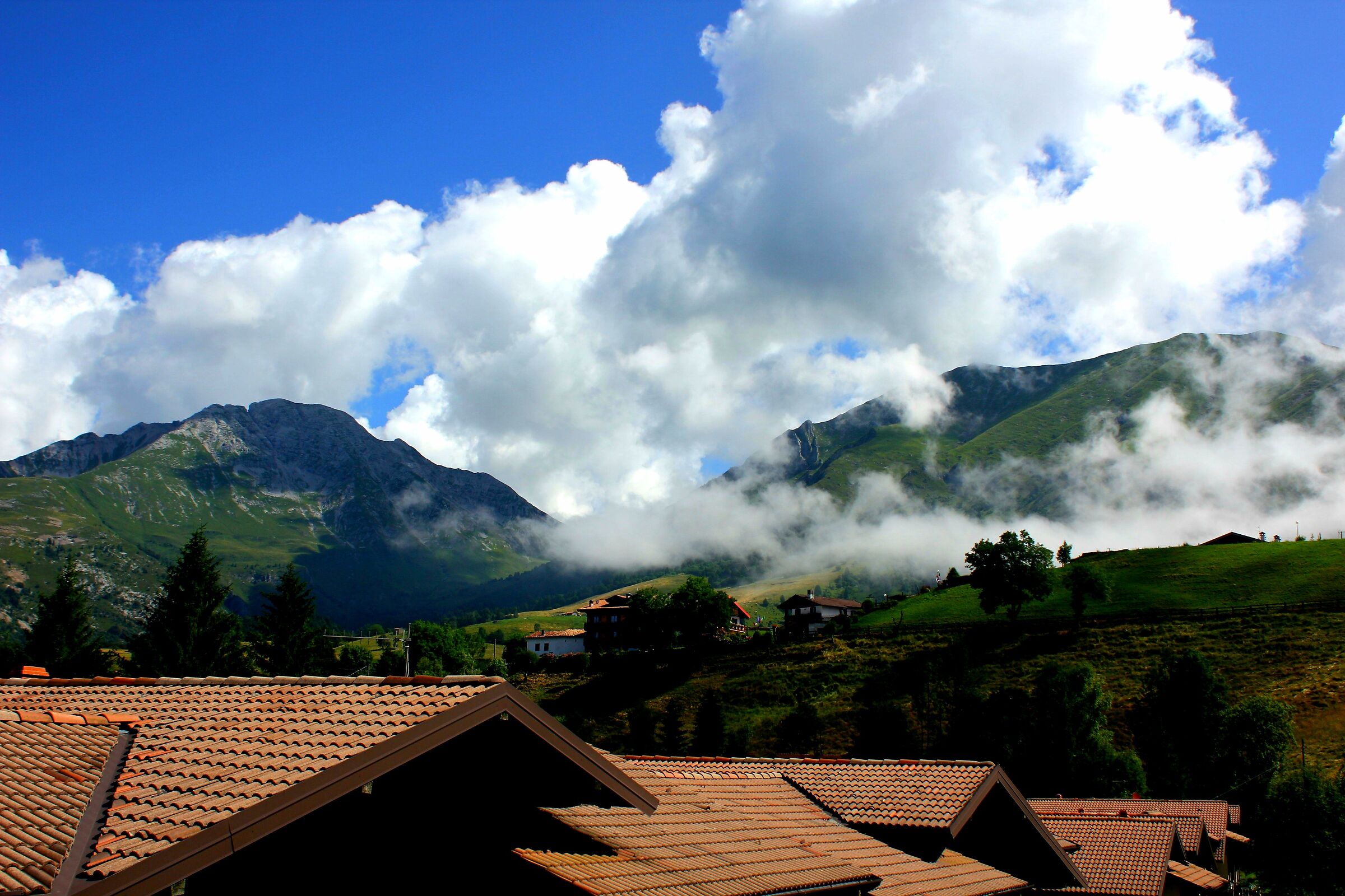Clouds envelop mountains and country
