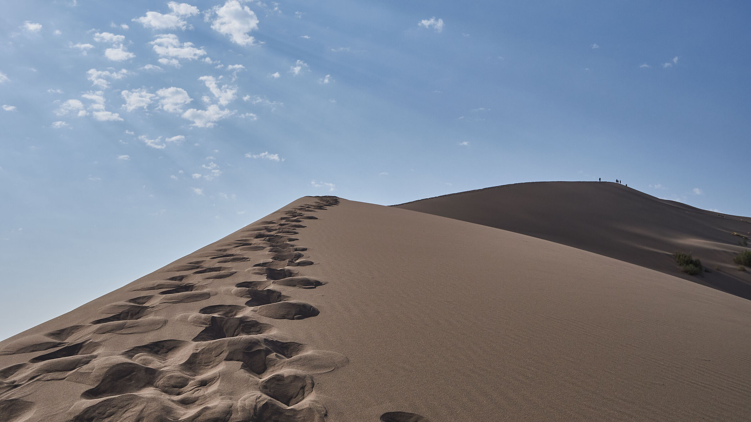 Climbing the Singing Dunes