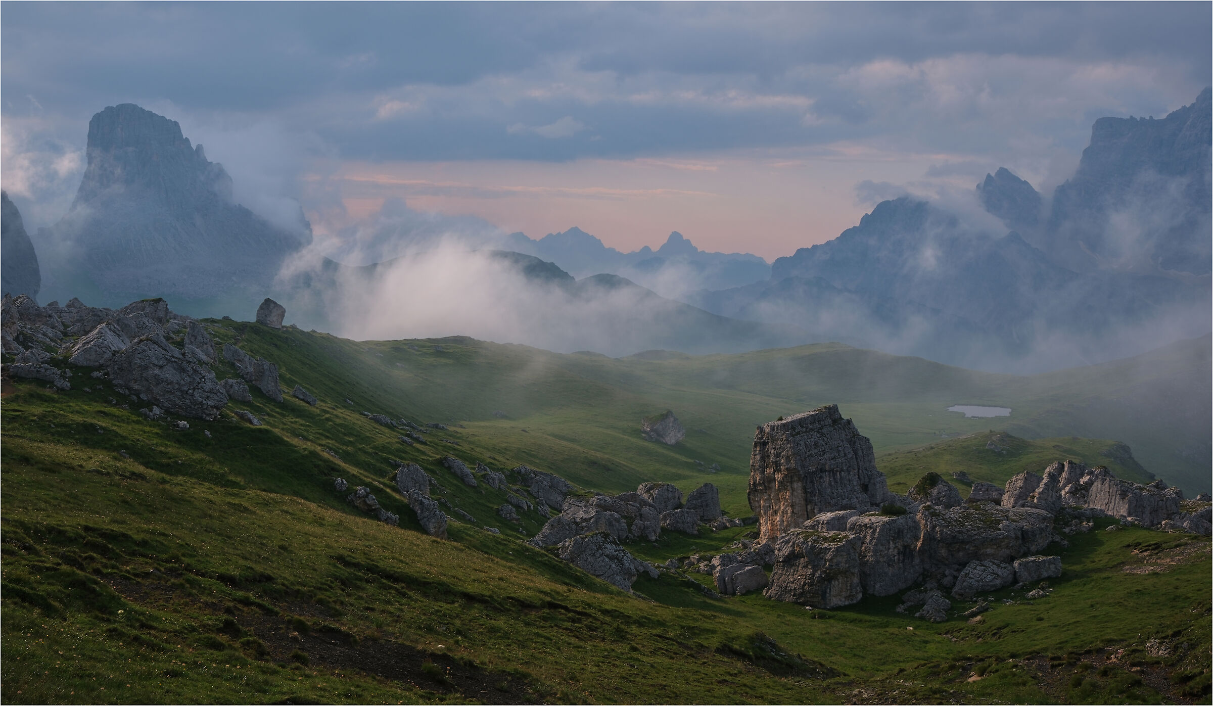 -a landscape in the fog-