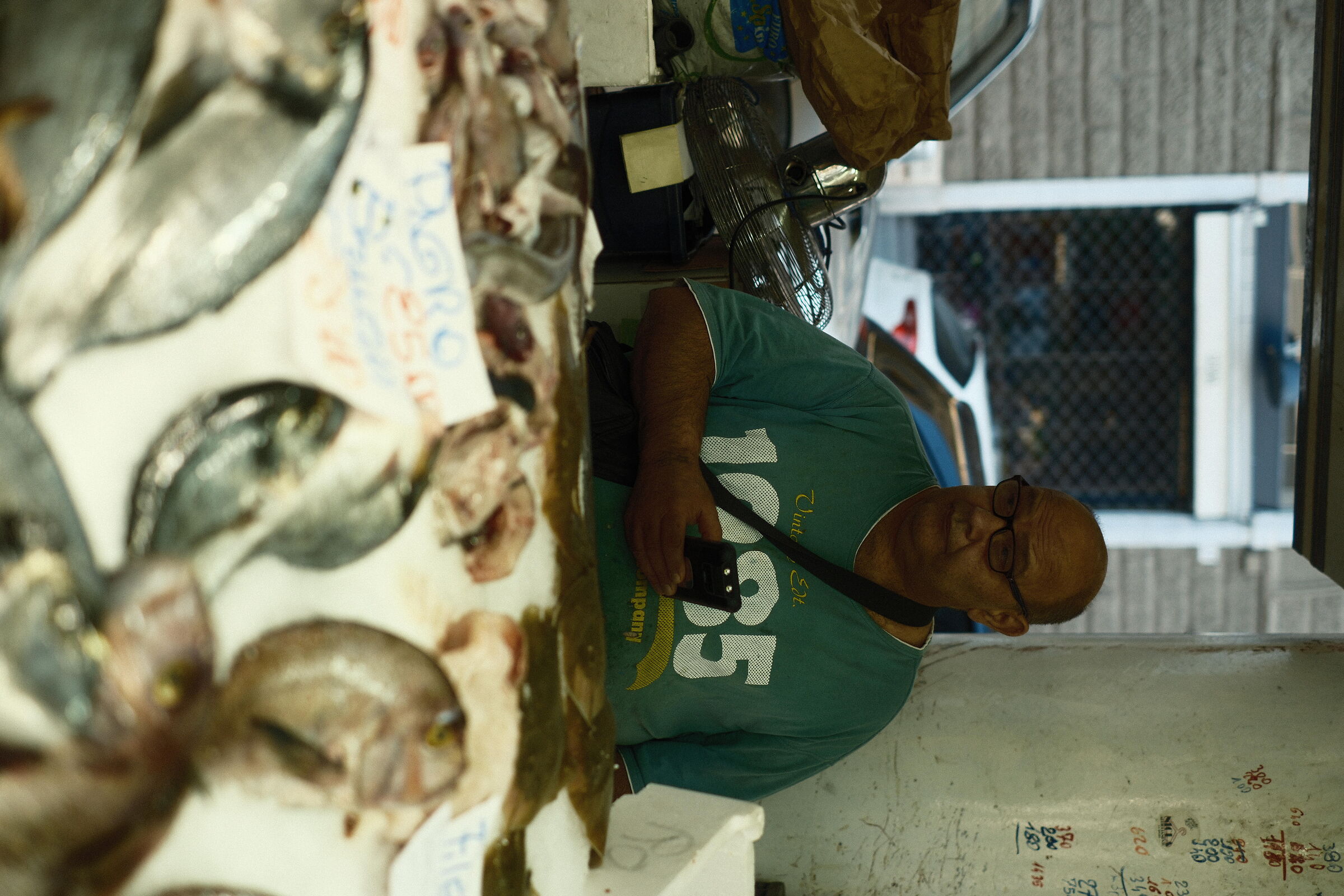Bored fishmonger
