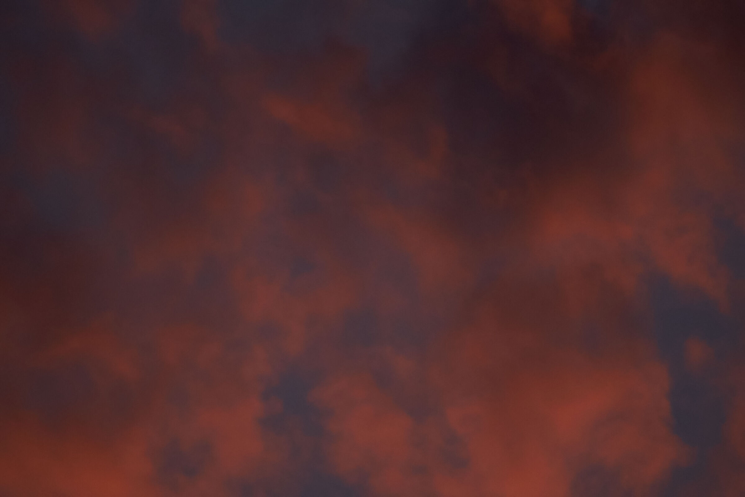 Red clouds in blue sky 1